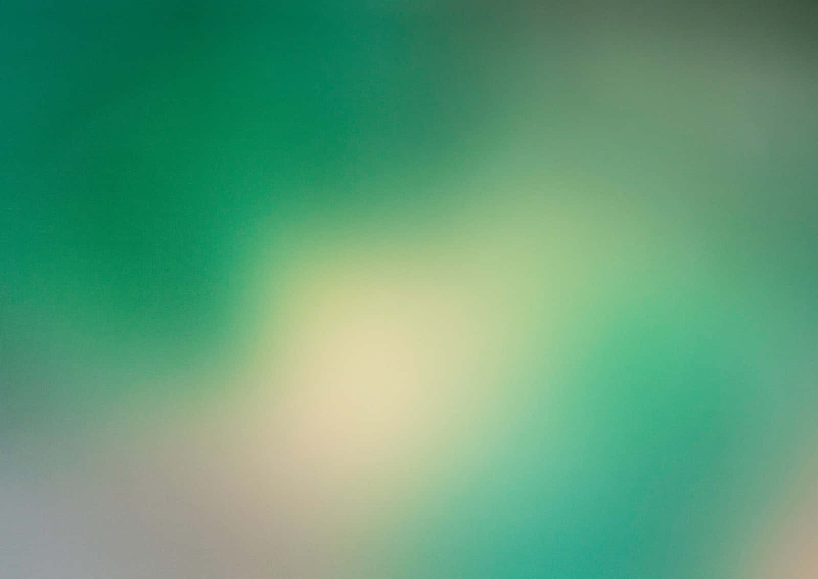 1600x1133 Download A Blurry Background With Green And Yellow Wallpaper