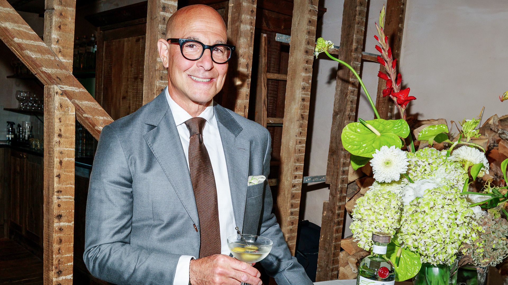 1920x1080 Cocktail hour with Stanley Tucci. Wallpaper*