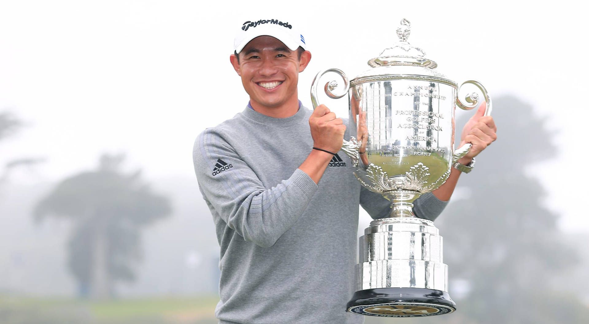 1920x1058 Download Collin Morikawa holding his PGA Trophy triumphantly Wallpaper
