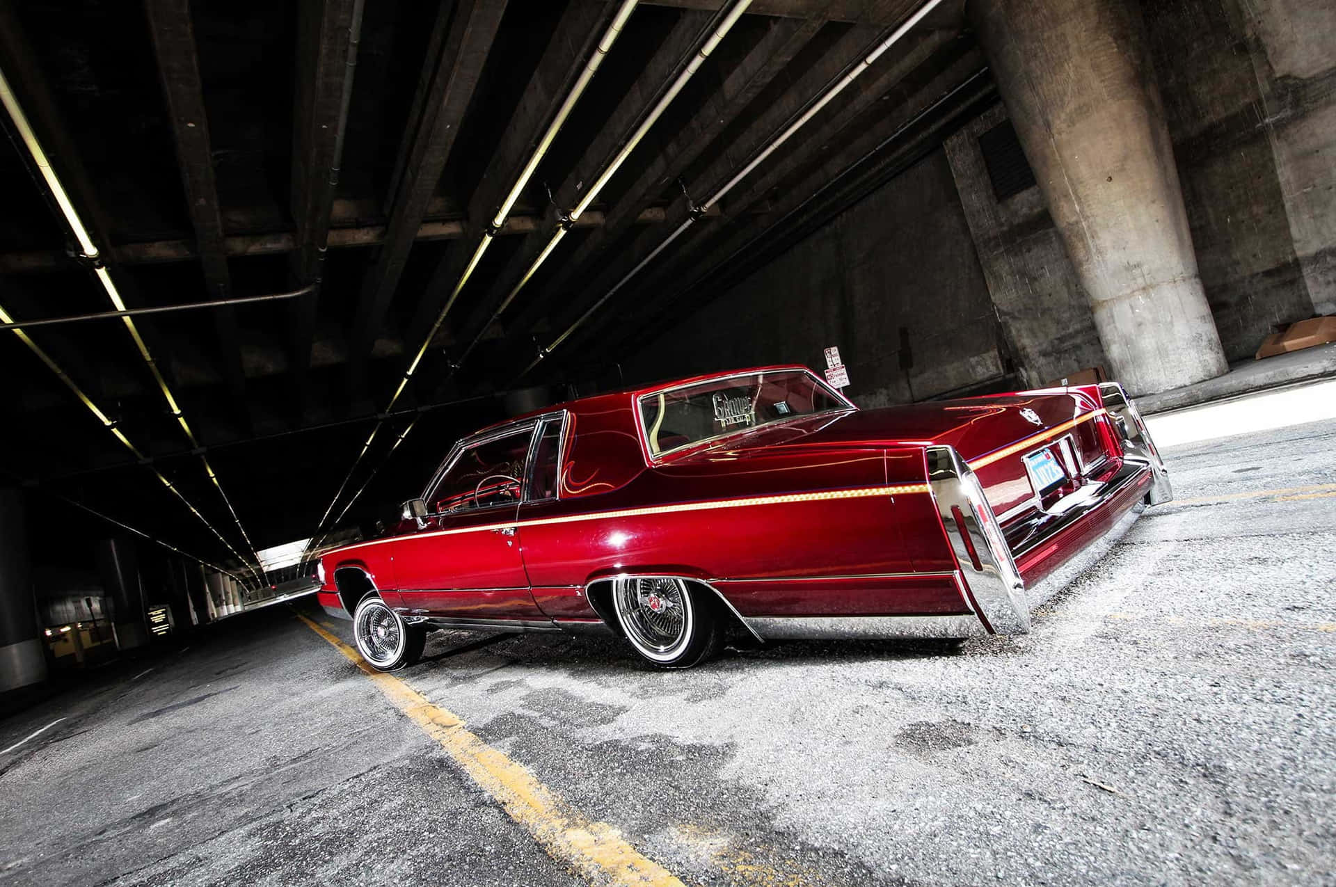 1920x1275 Download Sleek and Stylish Cadillac Deville Cruising the Road Wallpaper