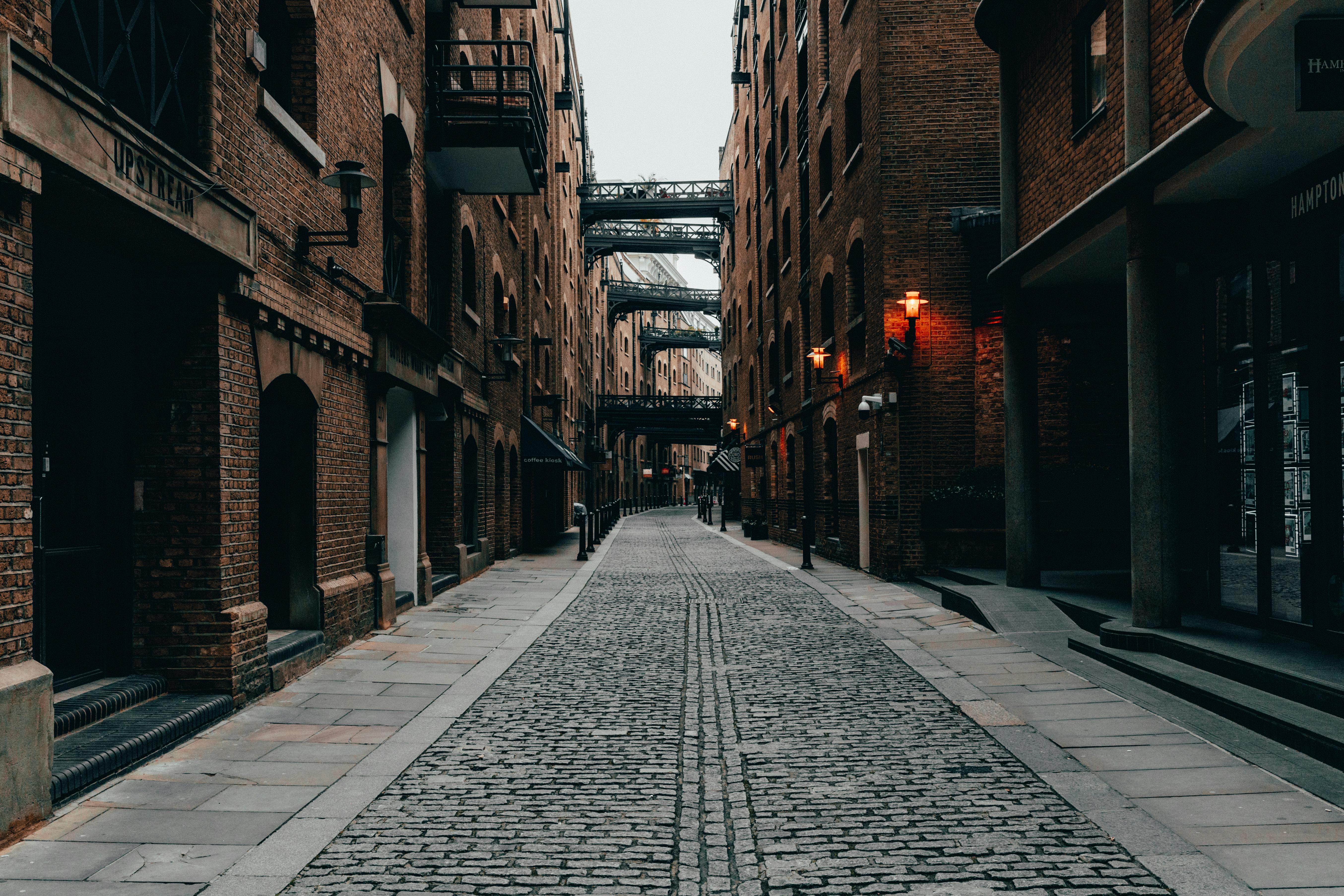 5418x3612 Street in between Brick Buildings · Free