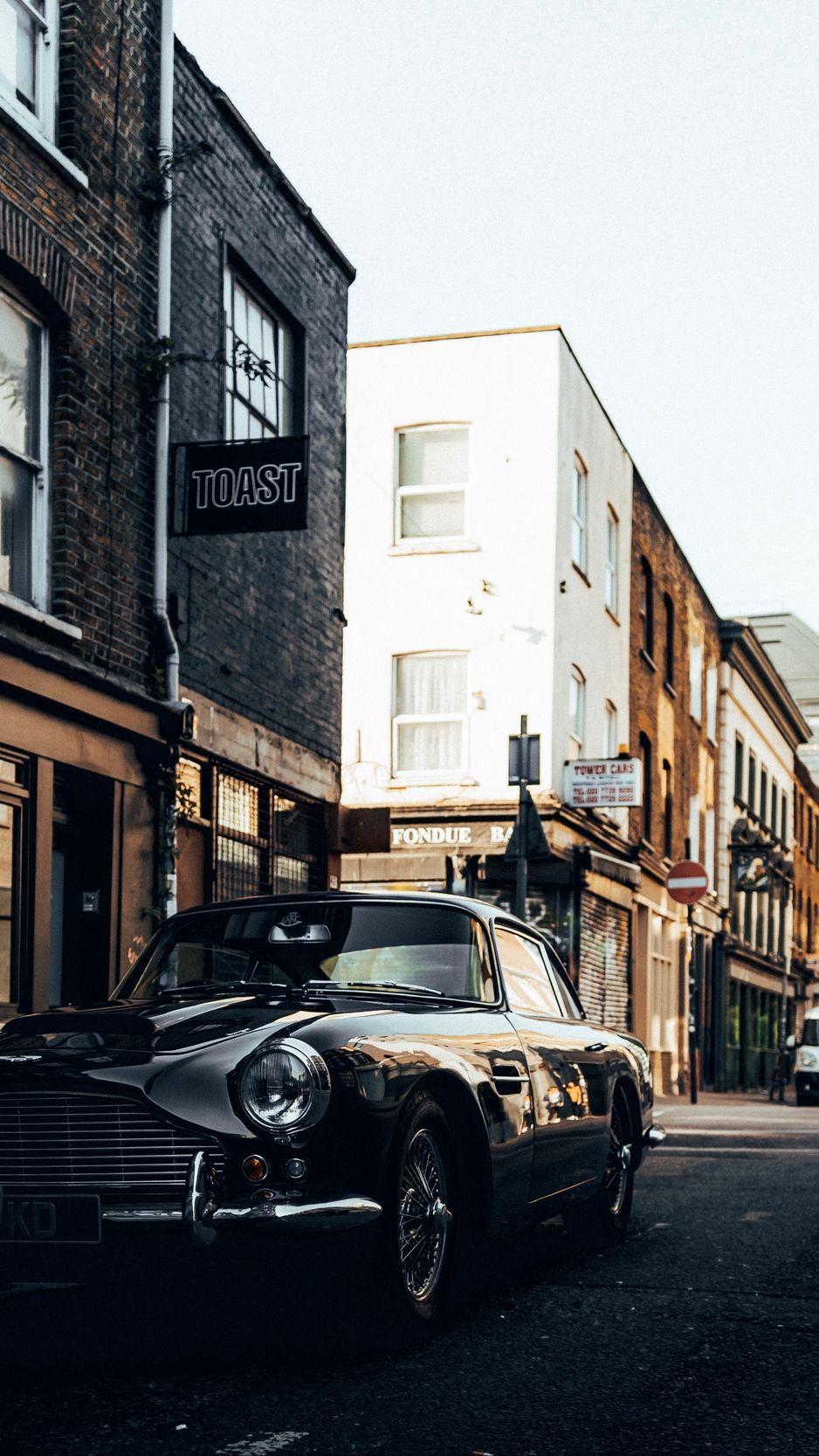 938x1668 Download wallpaper 938x1668 machine, lights, retro, vintage