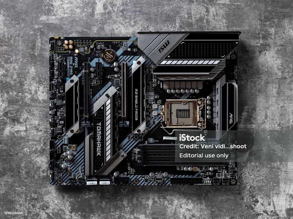 1024x768 Msi Mag Z490 Tomahawk Gaming Motherboard On A Dark Background Modern Desktop Pc Hardware Components For Build And Upgrade Top View Image Now