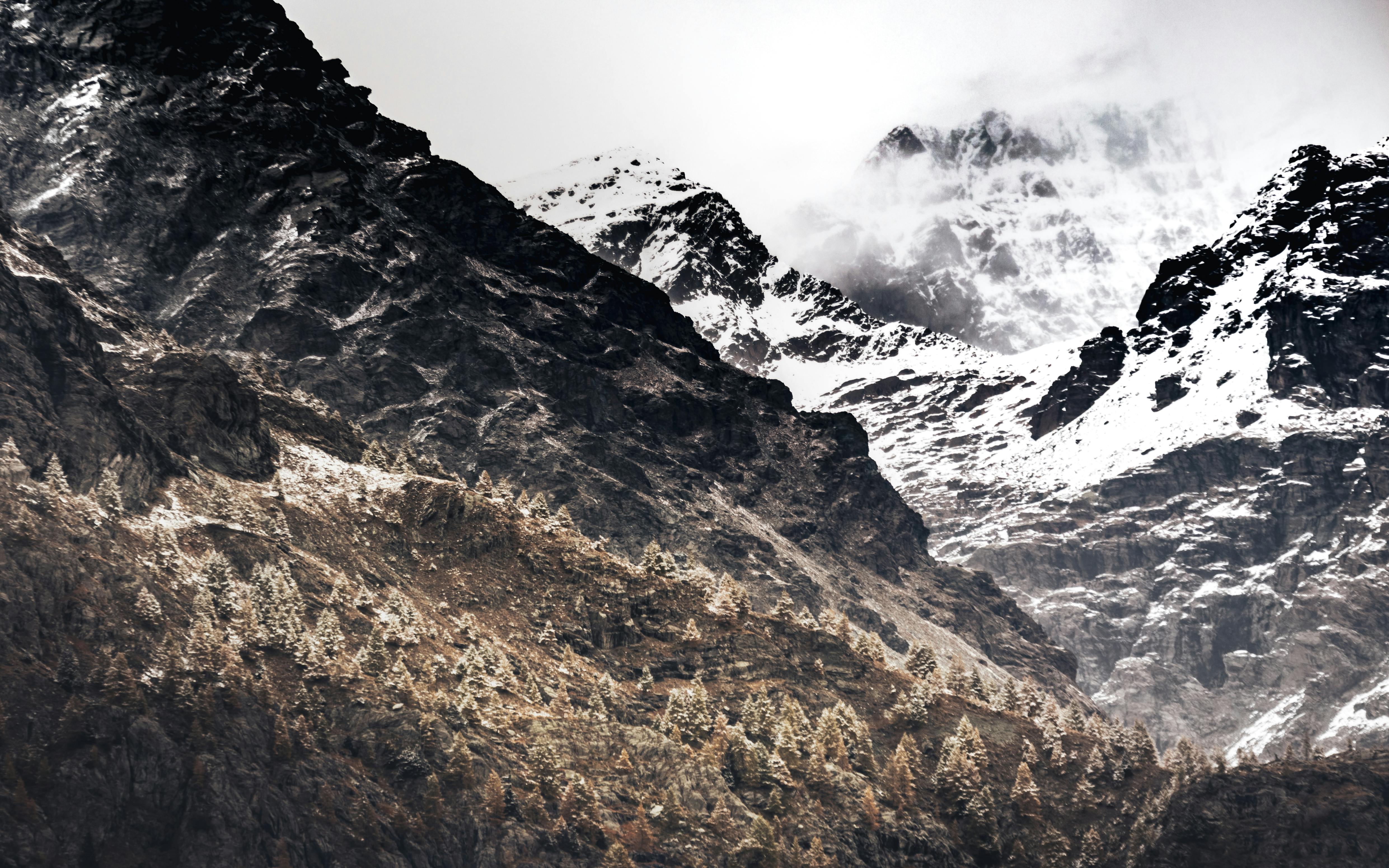 4963x3102 A Snow Capped Mountainside · Free