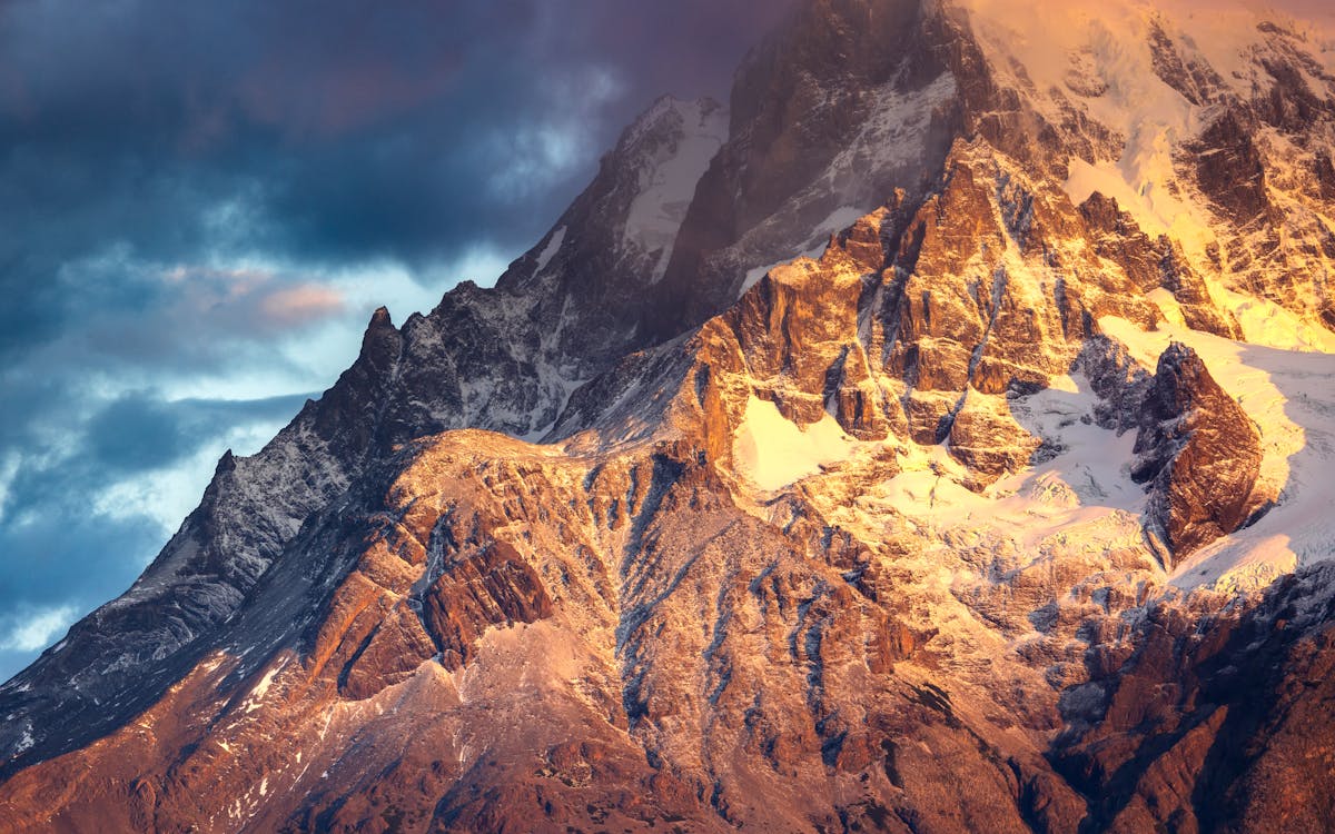 1200x750 Rugged Mountainside in the Light of the Rising Sun · Free