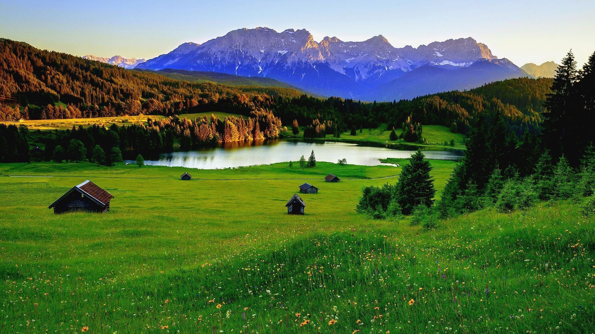 1920x1080 Hills With Green Grass And House In Background Of Mountain And Sky HD Nature Wallpaper