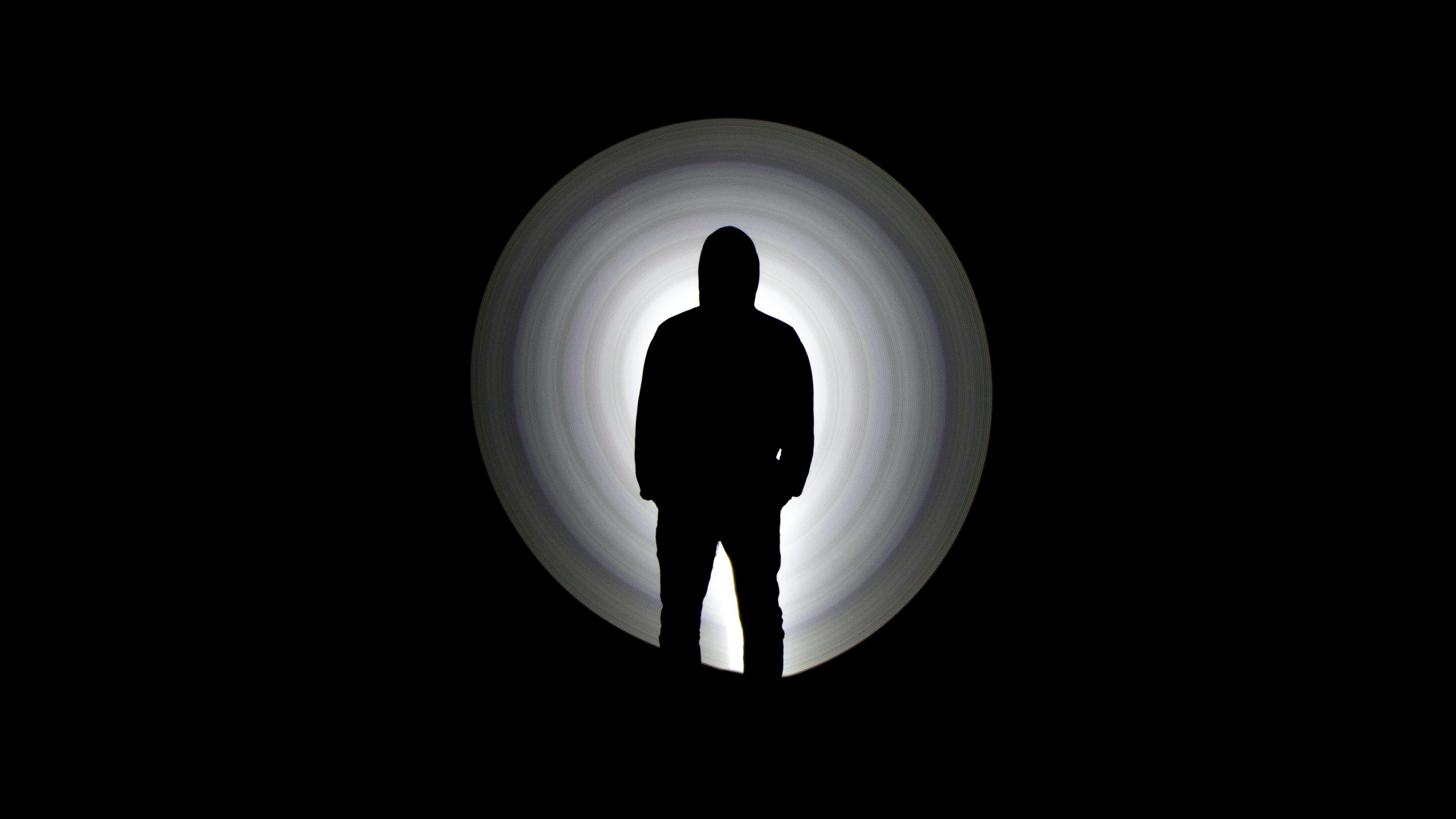 3840x2160 Download wallpaper 3840x2160 man, silhouette, dark, darkness, black and white 4k uhd 16:9 HD background