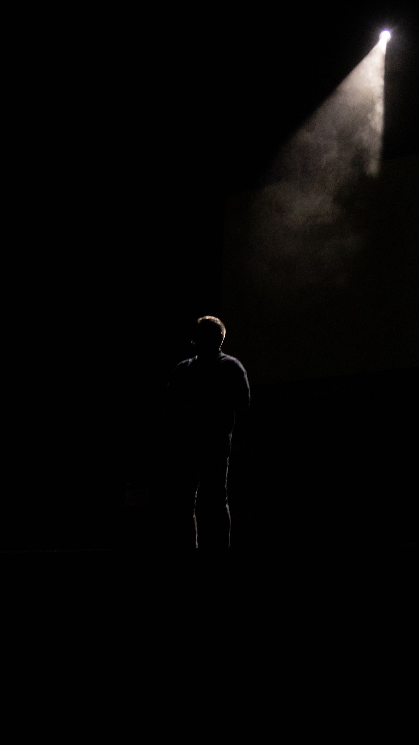 1350x2400 Download wallpaper 1350x2400 man, silhouette, alone, light, ray, dark, black iphone 8+/7+/6s+/for parallax HD background