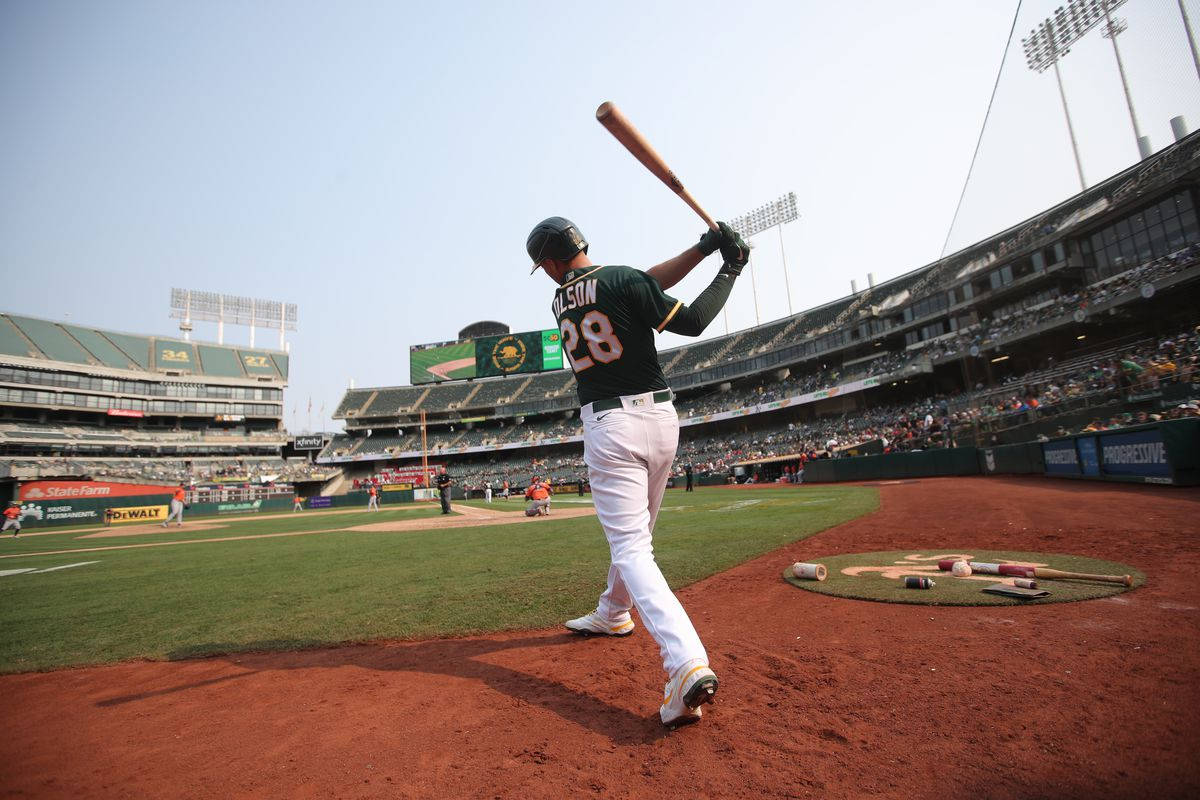 1200x800 Download Matt Olson Swinging Bat From Stadium Wallpaper