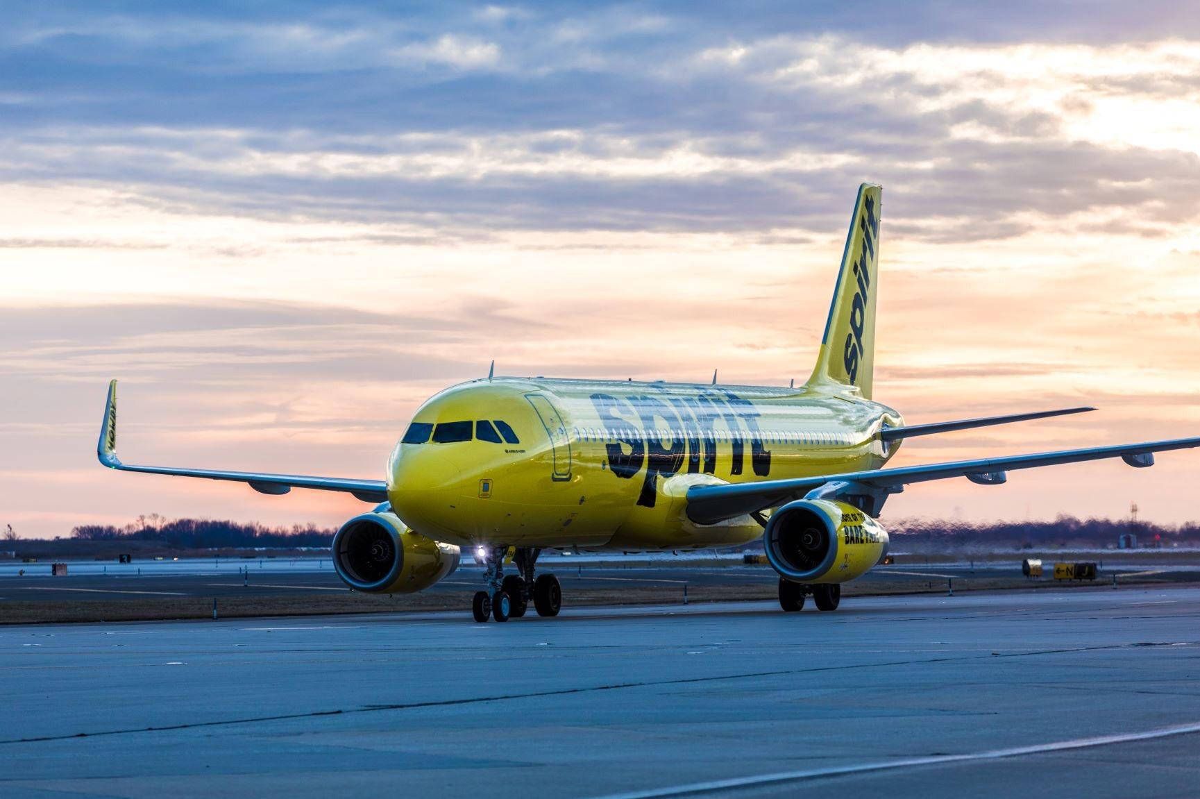 1729x1151 Download Spirit Airlines Airplane On Runway Wallpaper