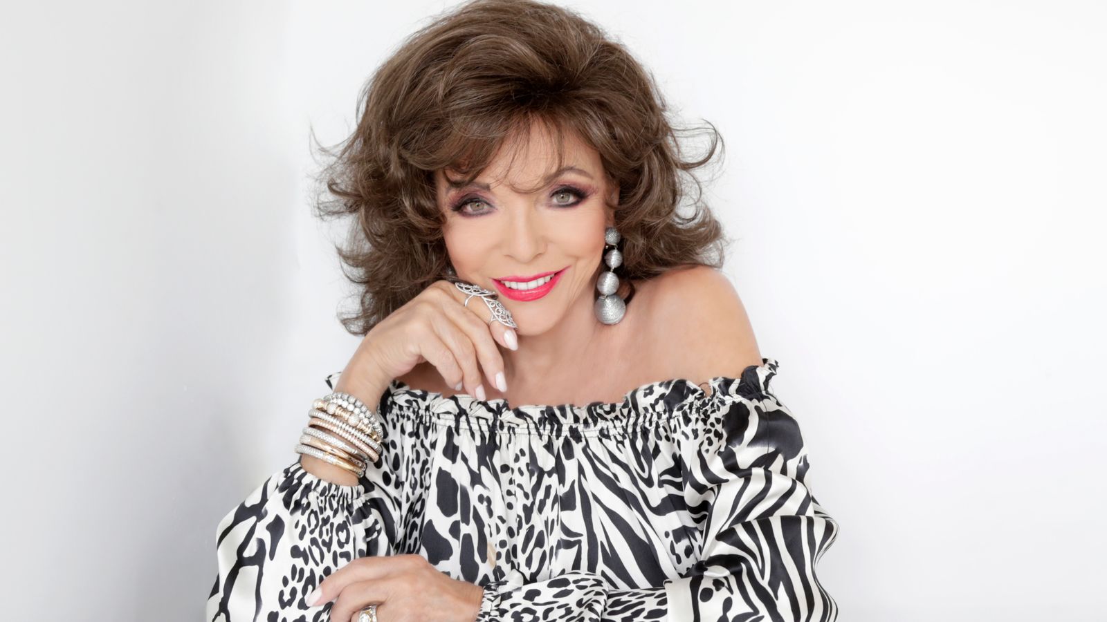 1600x900 Dame Joan Collins 'uncensored': The star on documenting her showbiz life, meeting famous faces, and guns on film sets. Ents & Arts News