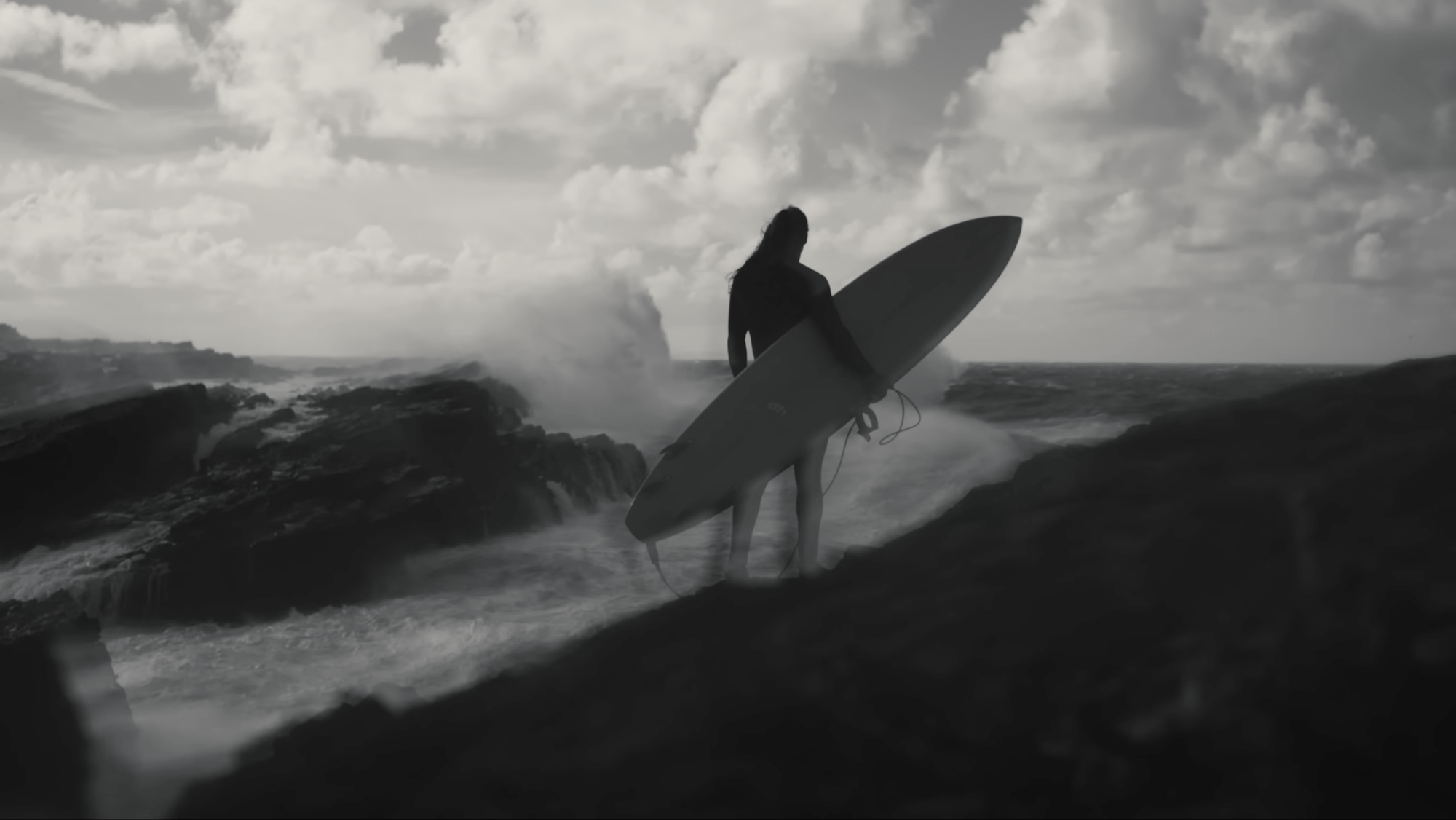 2000x1126 Joe Connor on capturing Ireland's giant waves for Gregory Alan Isakov's Mistakes: 'You had to feel the surfer is on a knife edge.'