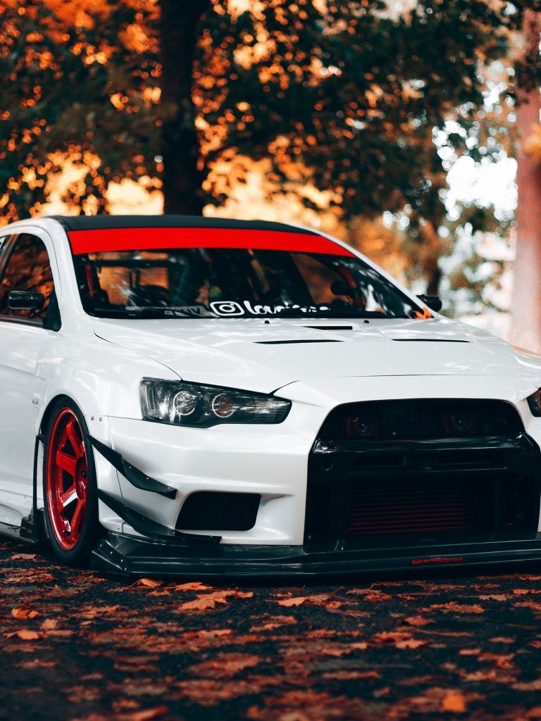 768x1024 Mitsubishi Lancer Evolution X Autumn 4K Wallpaper