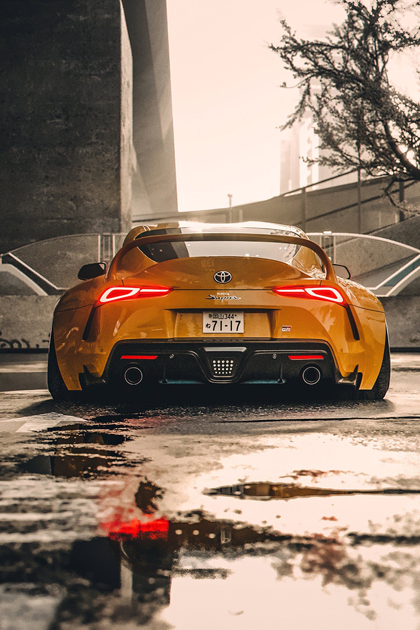 1440x2160 Toyota Supra Powerhouse: Urban Night Wallpaper