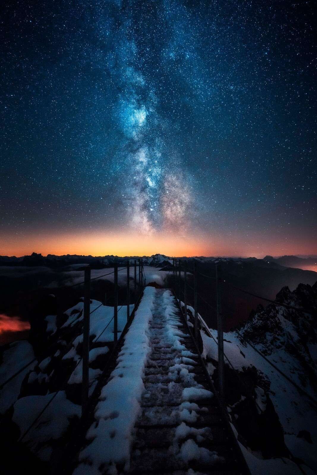 1067x1600 Wallpaper Mural Path Over Snowy Mountain