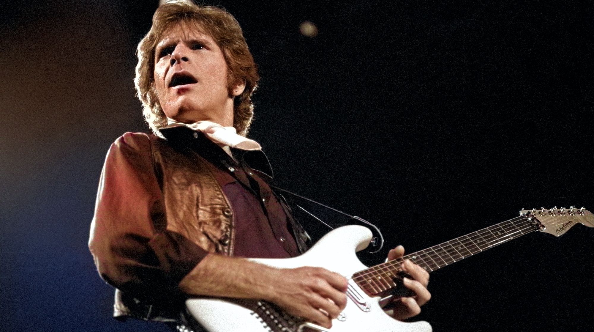 2000x1117 About a quarter mile out, some guy is flicking his lighter.” John Fogerty on the band that nearly ruined Creedence Clearwater Revival's Woodstock set