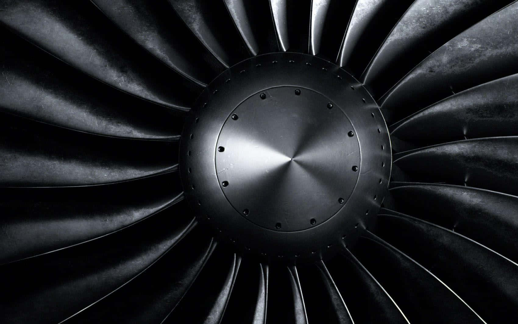 1700x1064 Download Powerful Jet Engine in Action Wallpaper