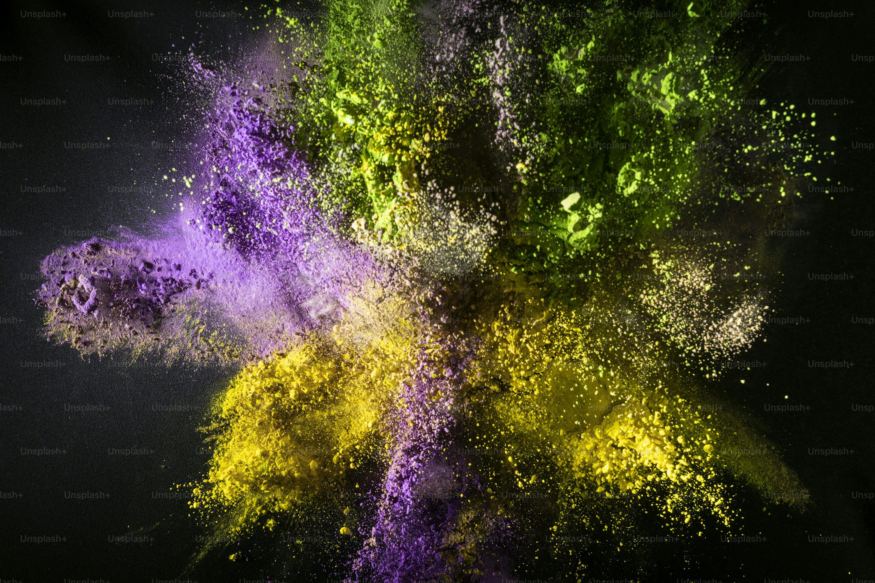 3000x2000 Colorful powder explosion against a black background photo