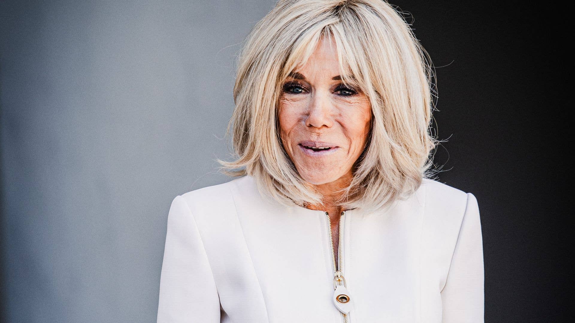 1920x1080 Brigitte Macron stuns in custom Louis Vuitton at the Paris 2024 Paralympics Opening Ceremony. HELLO!