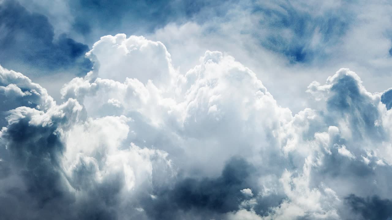 1280x720 cumulonimbus clouds were thick and moving closer to the blue sky