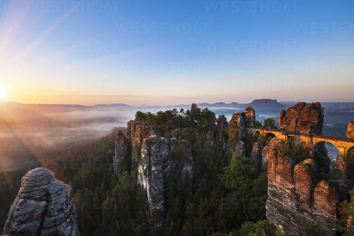 1232x821 Germany, Saxony, Saxon Switzerland National Park, Elbe Sandstone Mountains and Bastei bridge at sunrise