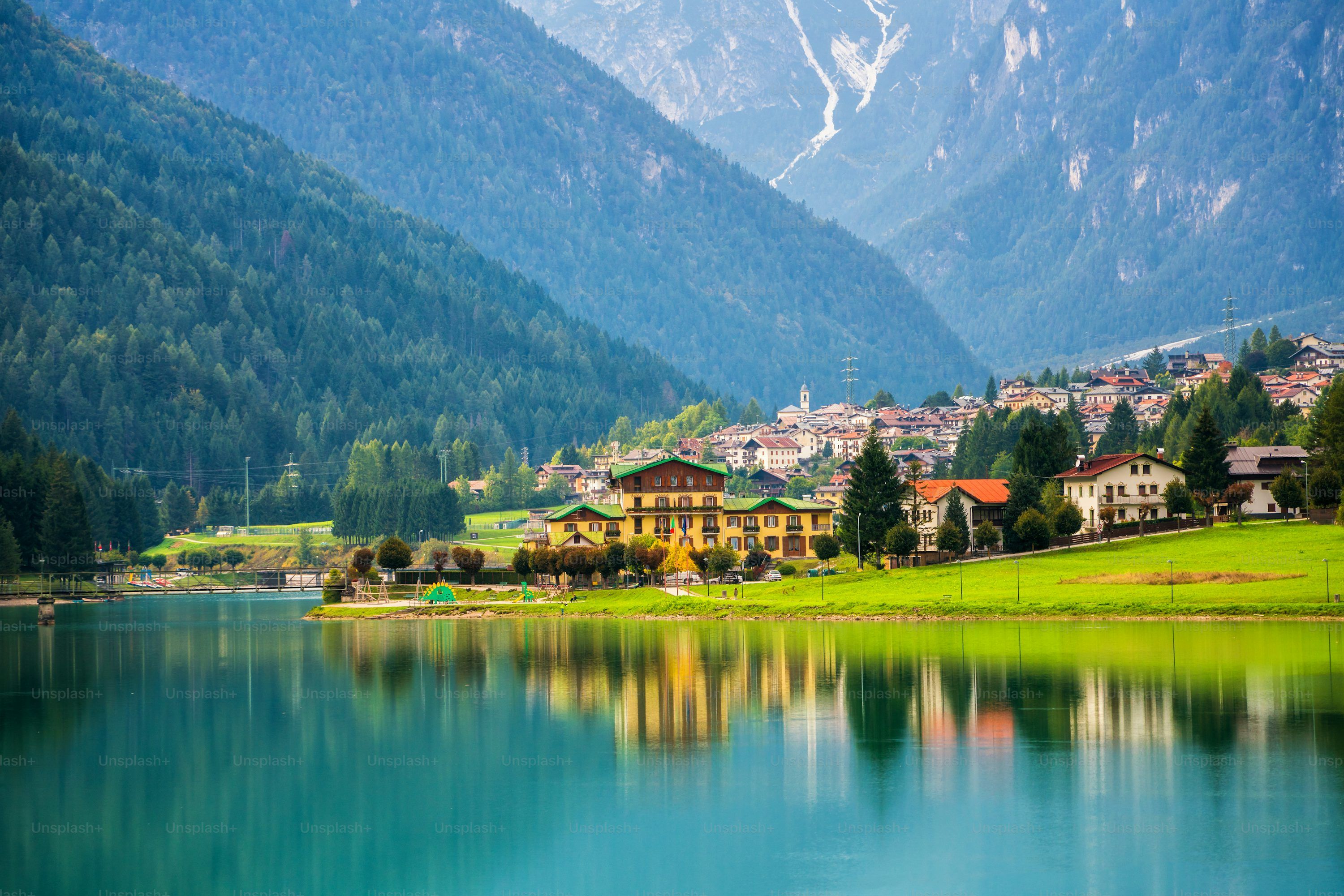3000x2001 A village in the mountains with a mountain in the background photo