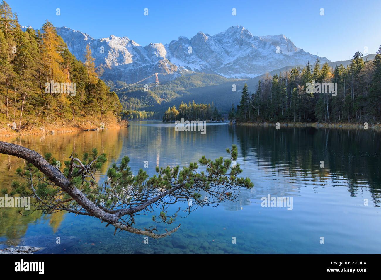 1300x956 Beautiful alpine panorama of Lake Eibsee with Germanys highest mountain Zugspitze in the background on a sunny afternoon in autumn