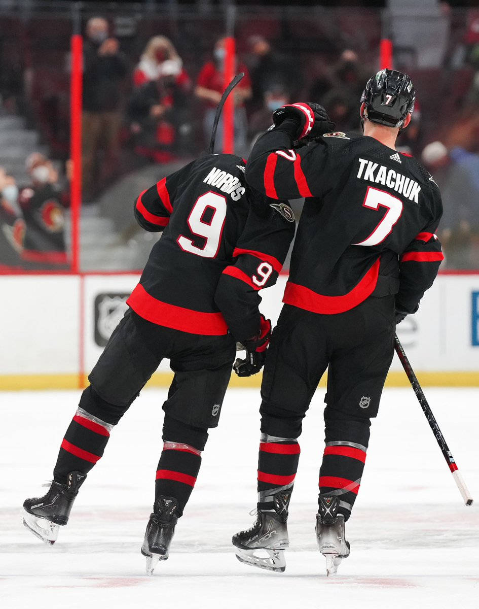 945x1200 Download Brady Tkachuk With Josh Norris Wallpaper