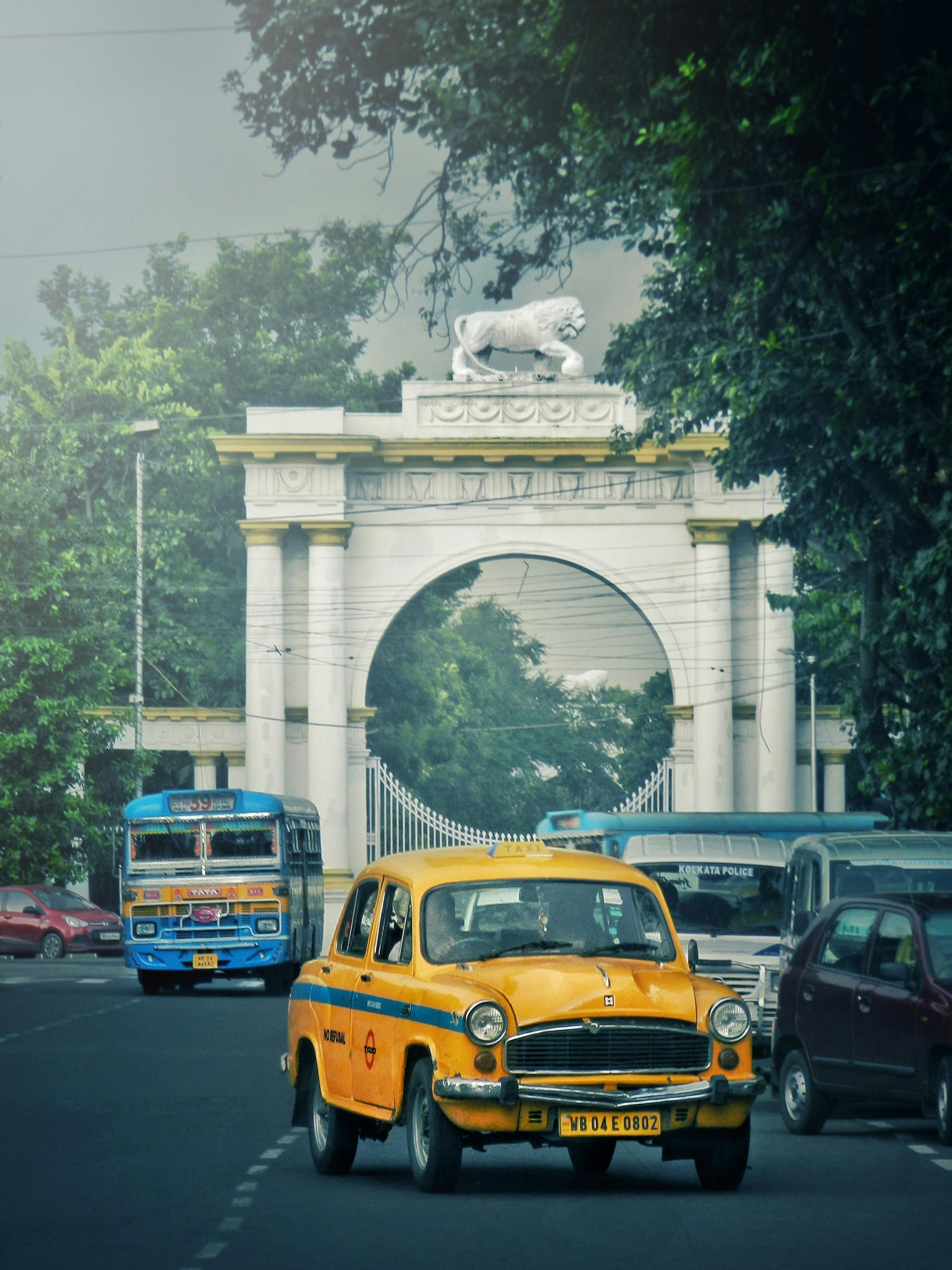 2779x3705 Photo of Yellow Taxi on Roadway · Free
