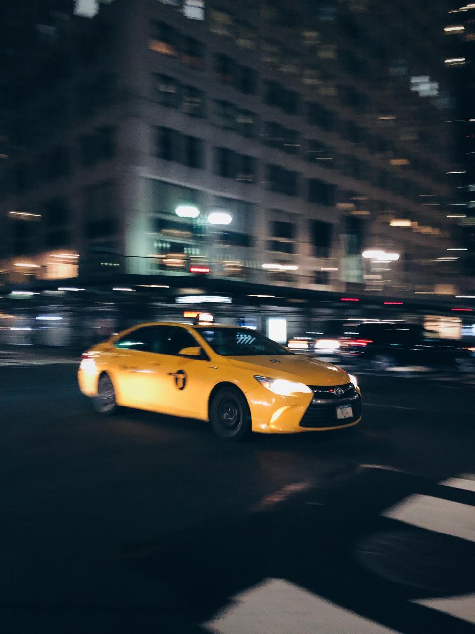 970x1293 Free of Yellow taxi in motion on New York streets. Download Free Image and Free Illustrations