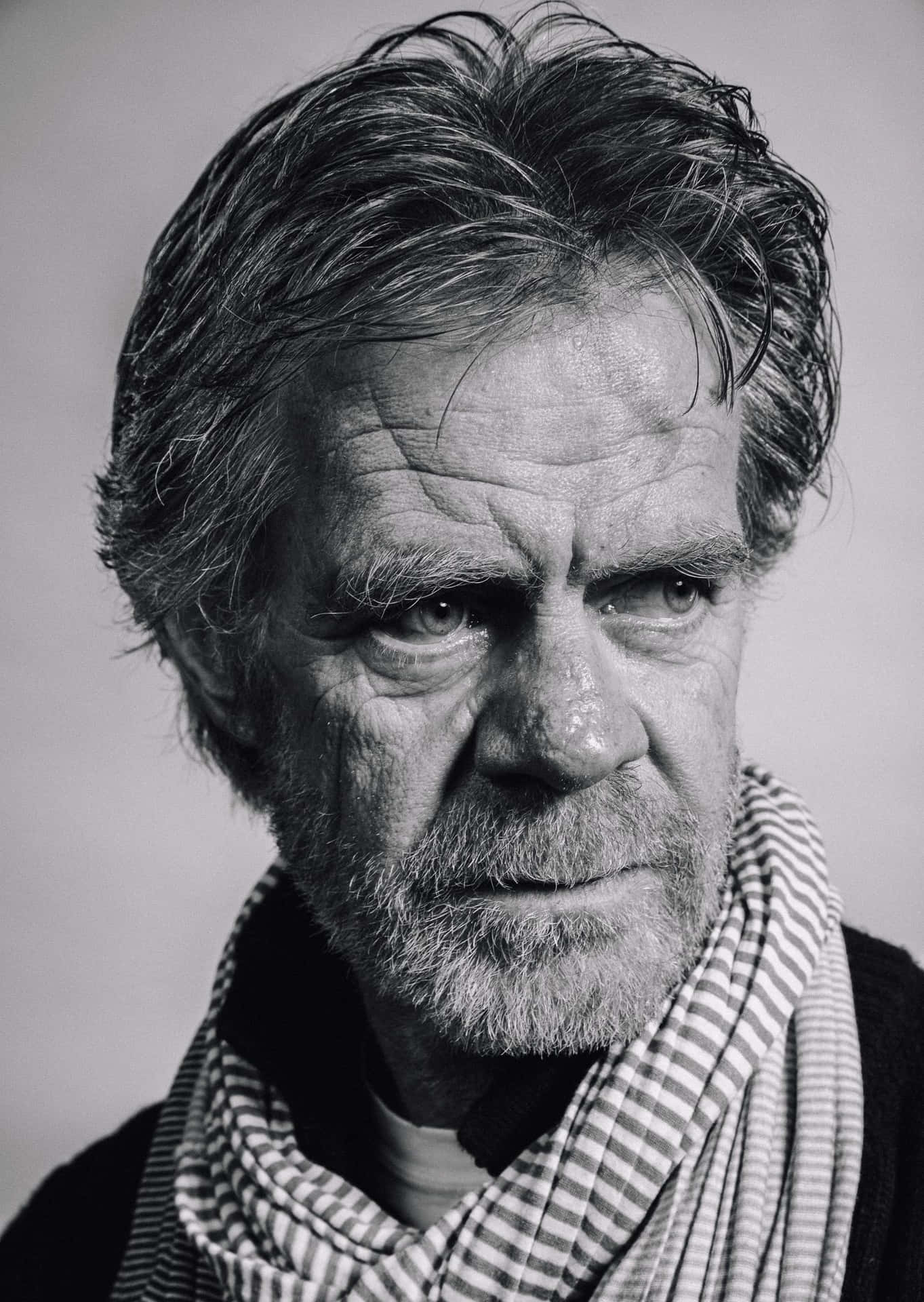 1363x1920 Talented Actor William H. Macy Poses Confidently In A High Resolution Wallpaper. Wallpaper