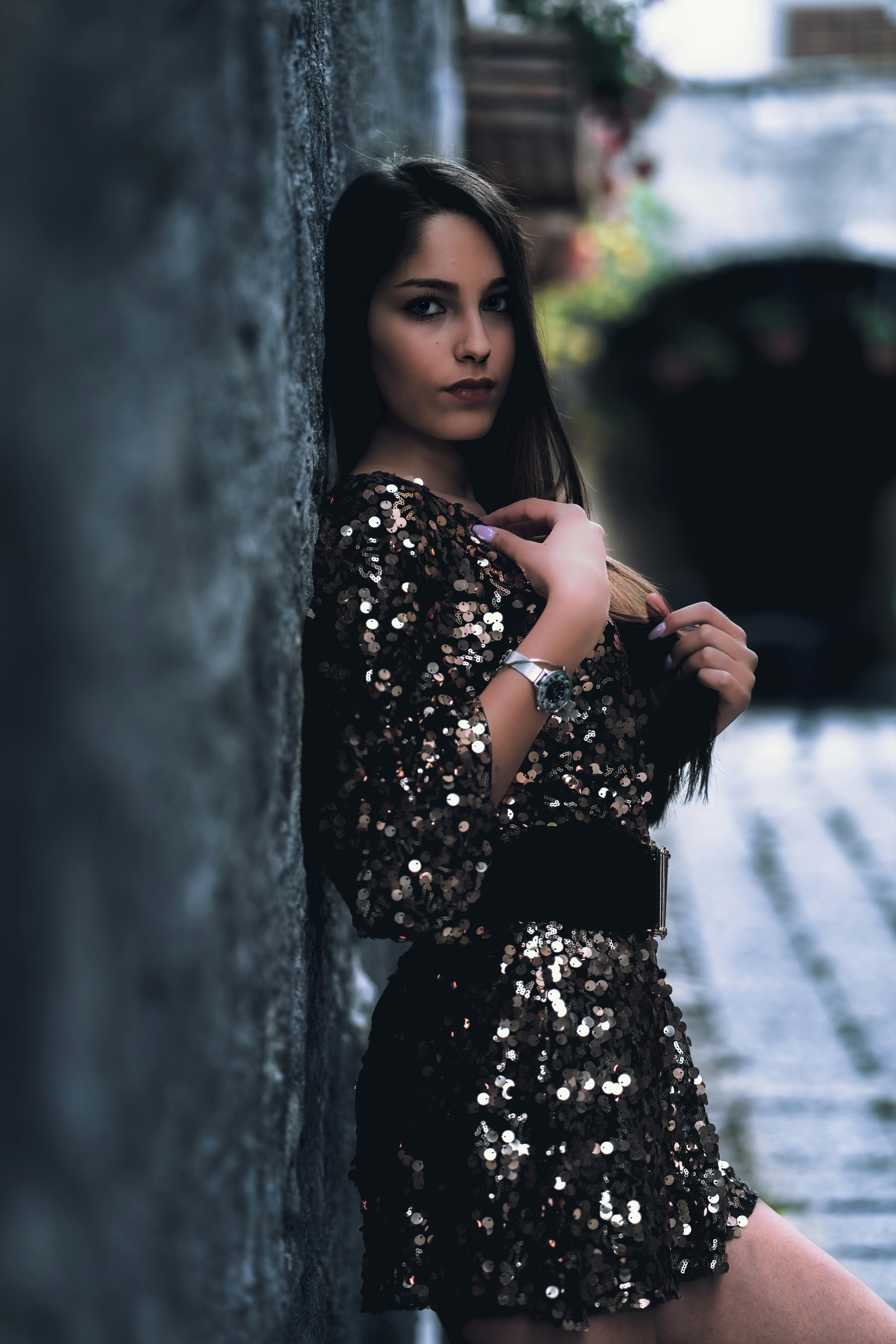 5260x7886 Photo of Woman in Black Sequin Dress Leaning on Wall · Free