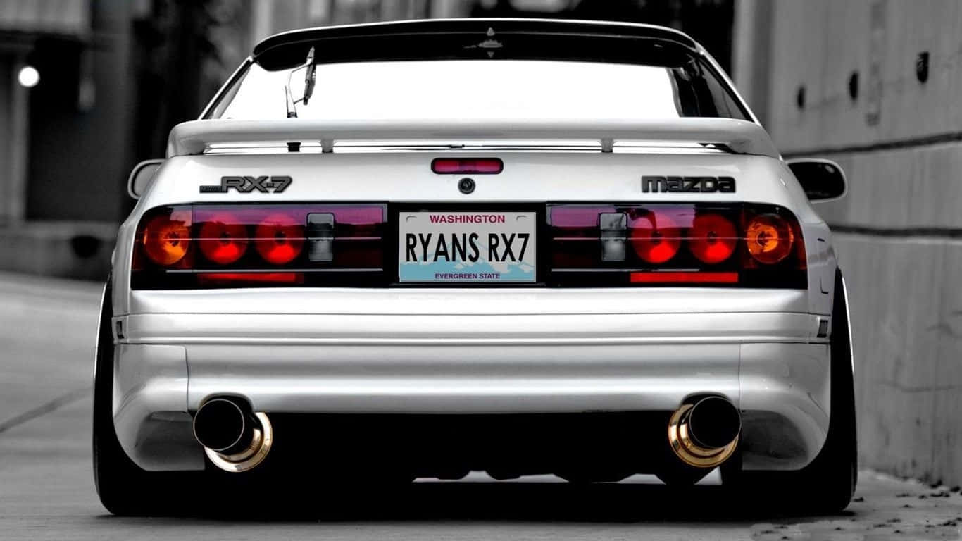 1366x768 Download Sleek elegance of the RX7 FC car model Wallpaper