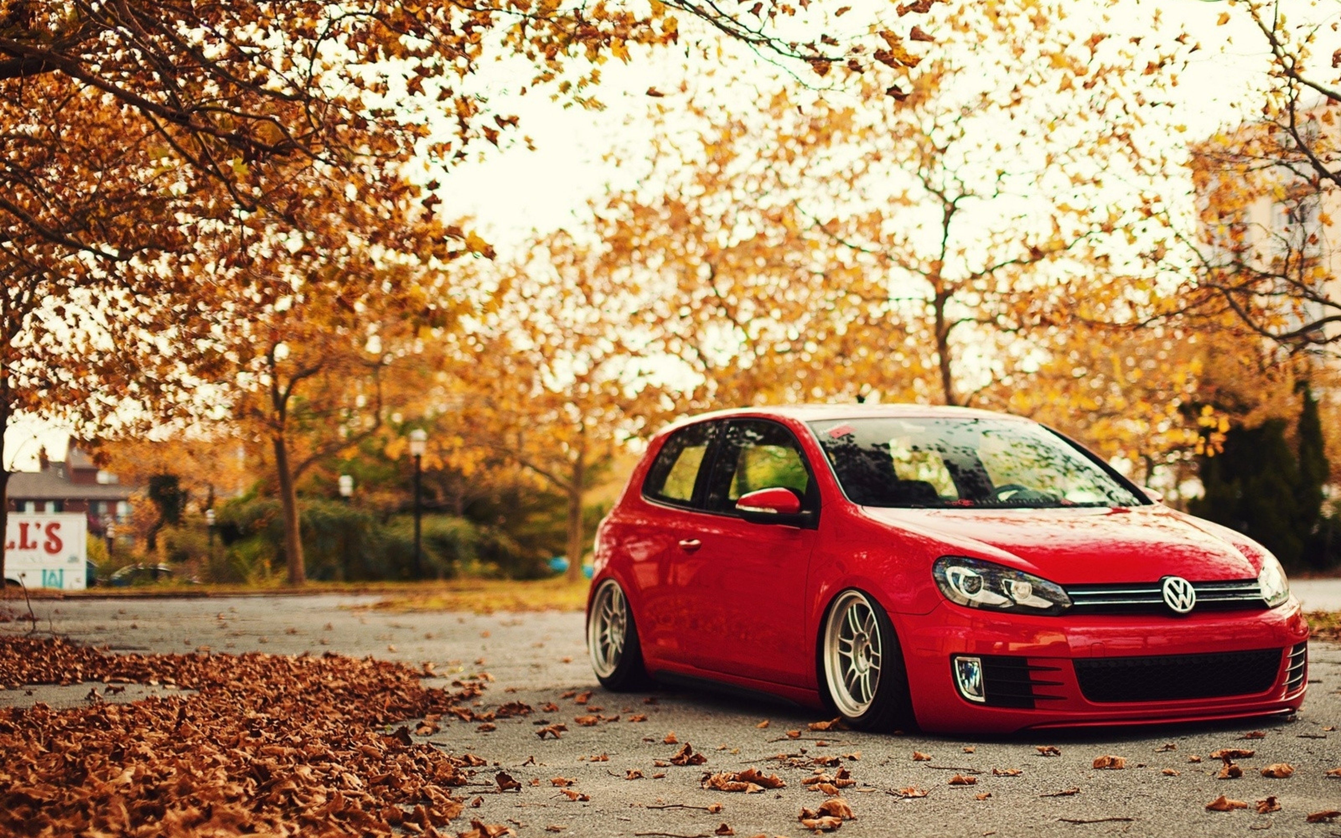 5120x3200 Wallpaper Red Volkswagen 5 Door Hatchback on Road During Daytime, Background Free Image