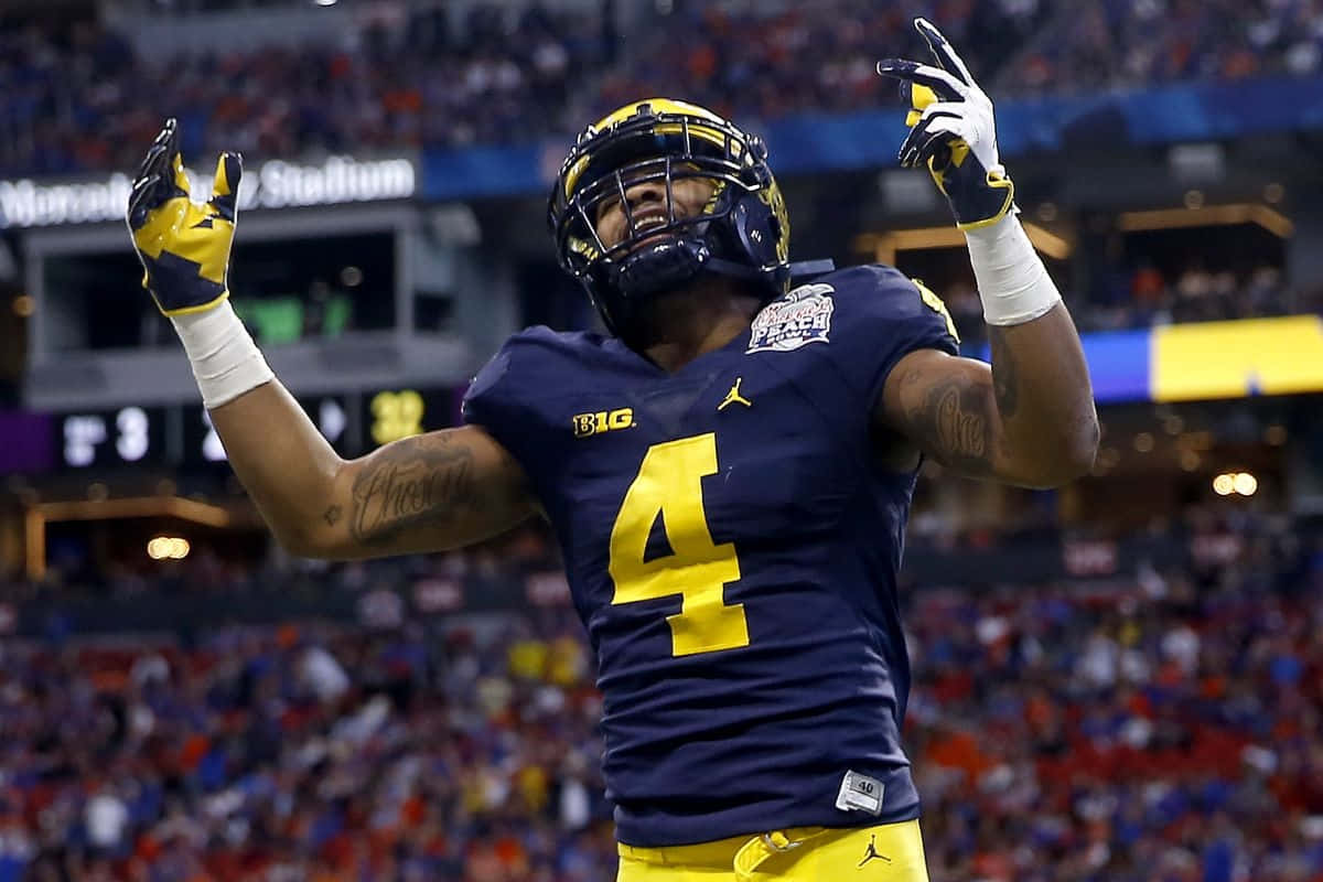 1200x800 Download Celebratory Football Player Nico Collins Wallpaper