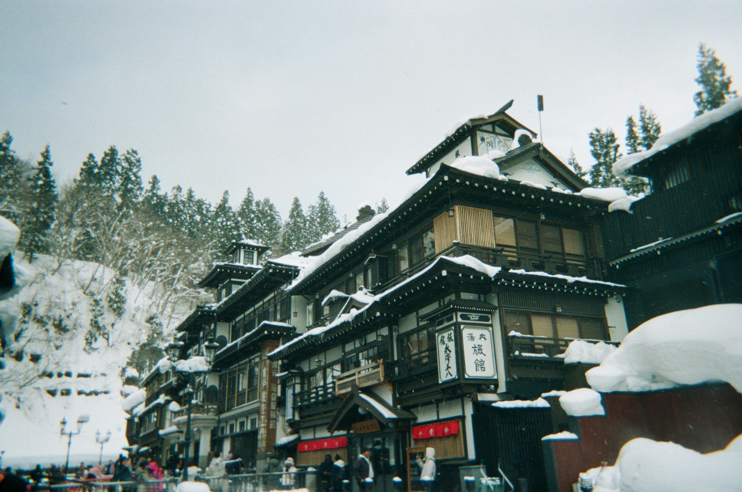 3089x2048 Historic Japanese Onsen Town in Winter Wonderland · Free