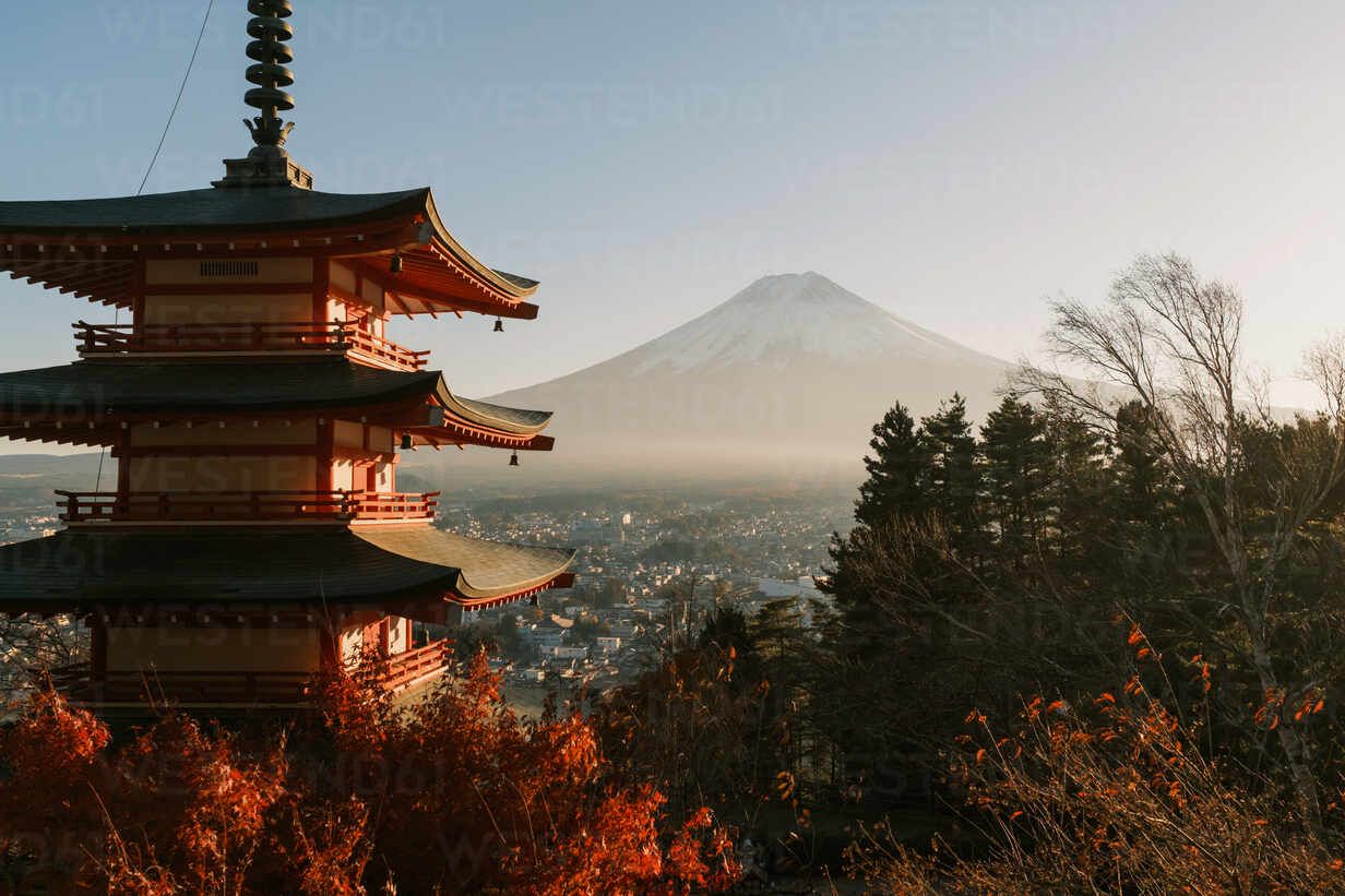 1232x821 A pictureque shot capturing the serene beauty of Mount Fuji with the iconic Chureito Pagoda in the foreground during a golden sunset