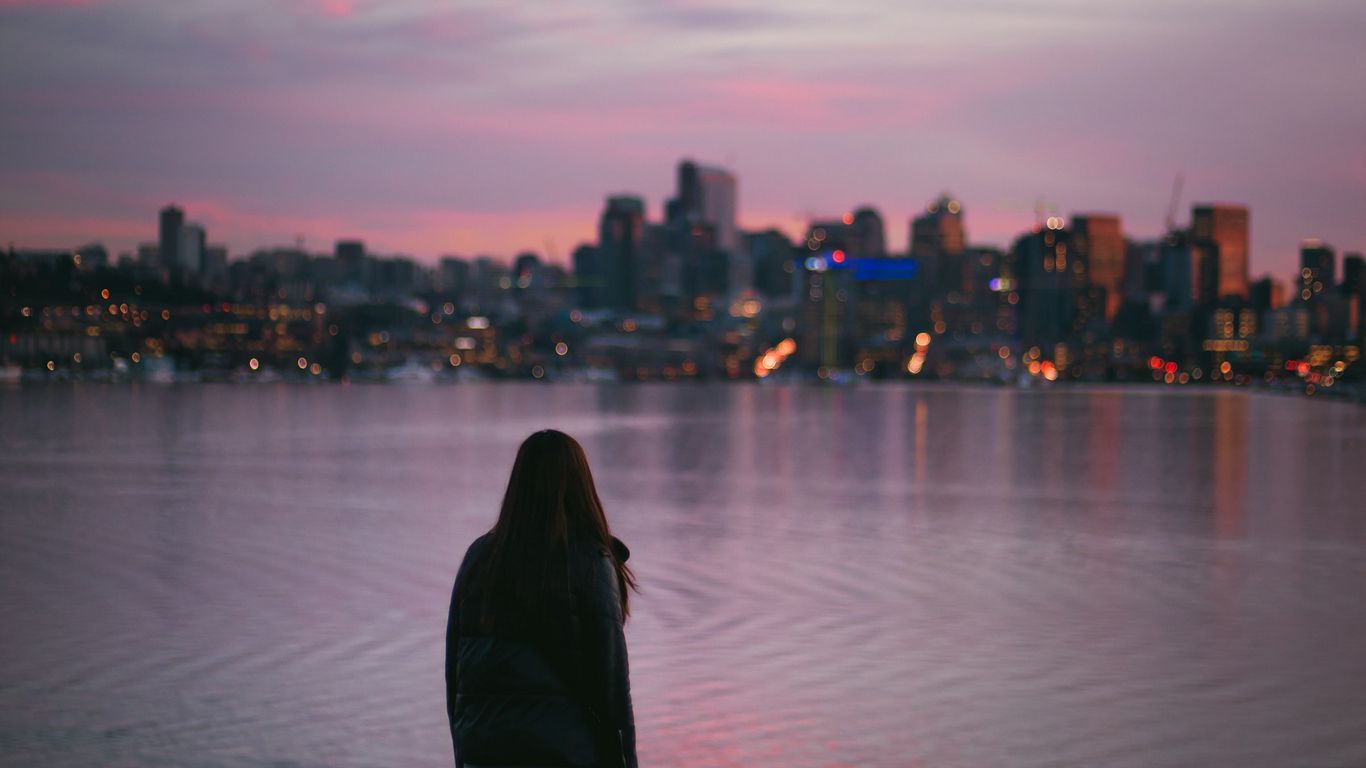 1366x768 Download wallpaper 1366x768 girl, loneliness, alone, city, sunset, water tablet, laptop HD background