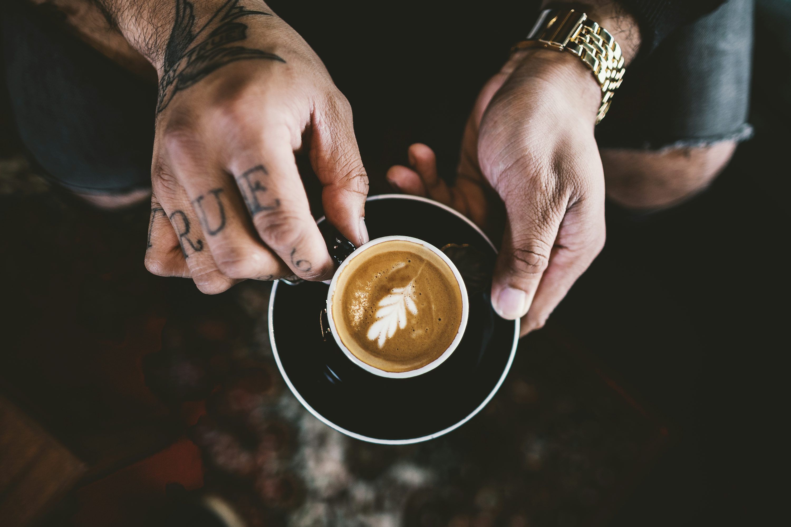 3000x2000 Person Holding Double Compound Leaf Coffee Art Photo