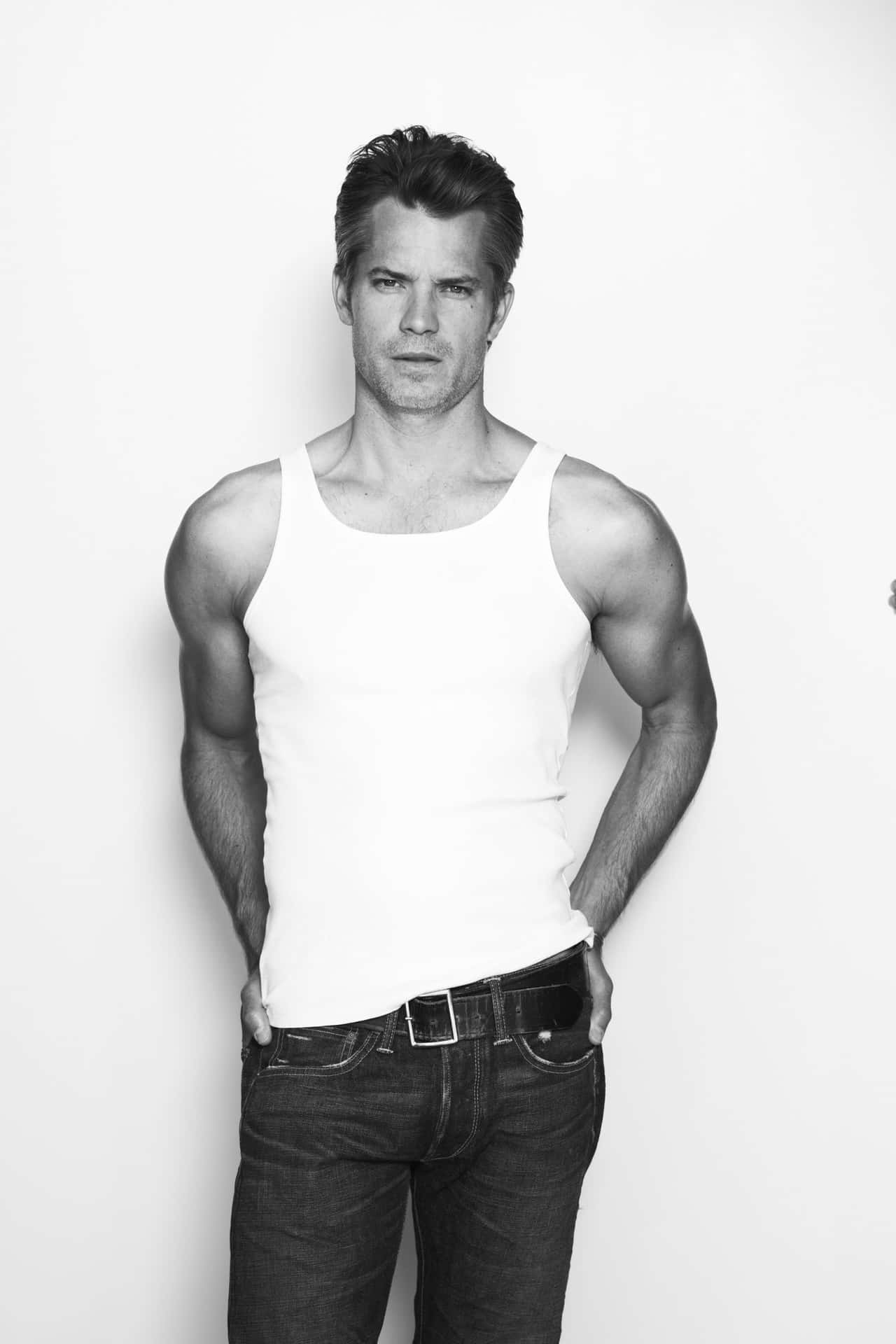1280x1920 Download Timothy Olyphant posing in a black and white portrait Wallpaper