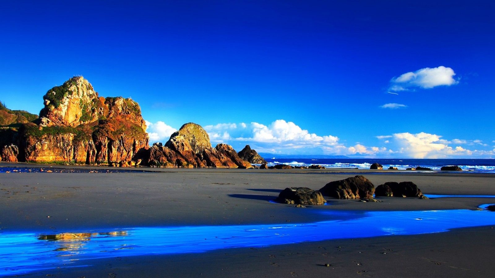 1600x900 Nice Beautiful View Of Rock Mountains And Blue Sea Under Blue Sky HD Nature Wallpaper