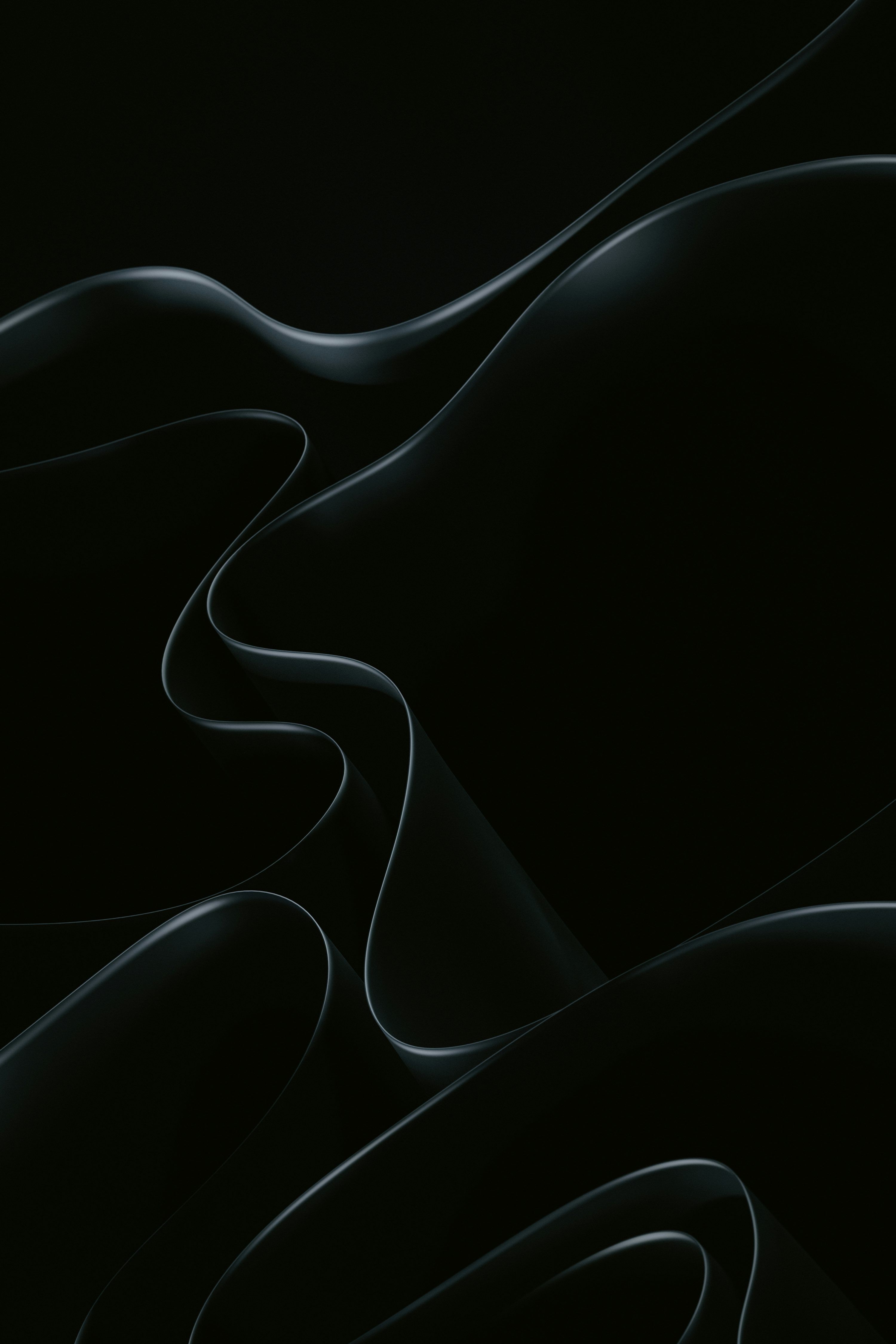 3000x4500 An abstract black background with wavy lines photo