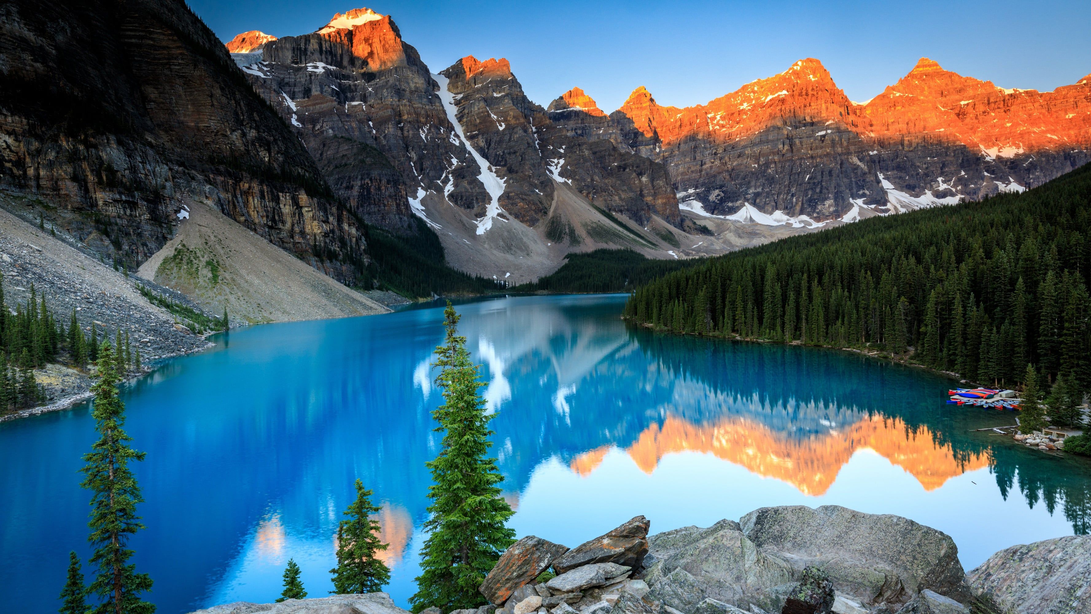 3554x1999 Lake in the forest surrounded by mountains Wallpaper 2K for Desktop