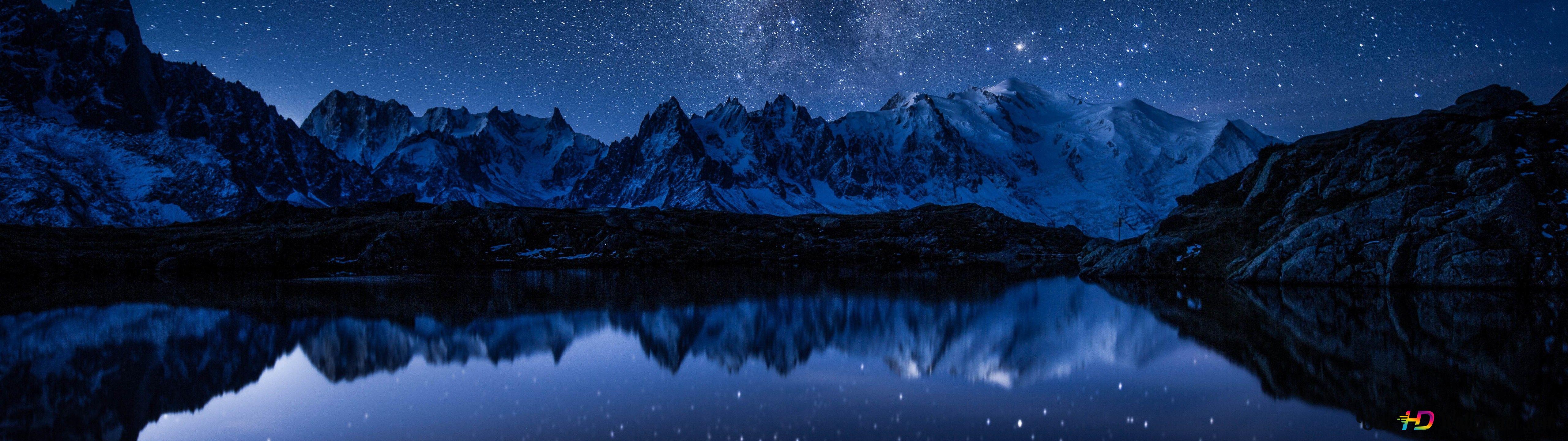 5120x1440 The silhouettes of snowy mountains reflected in the water 4K wallpaper download