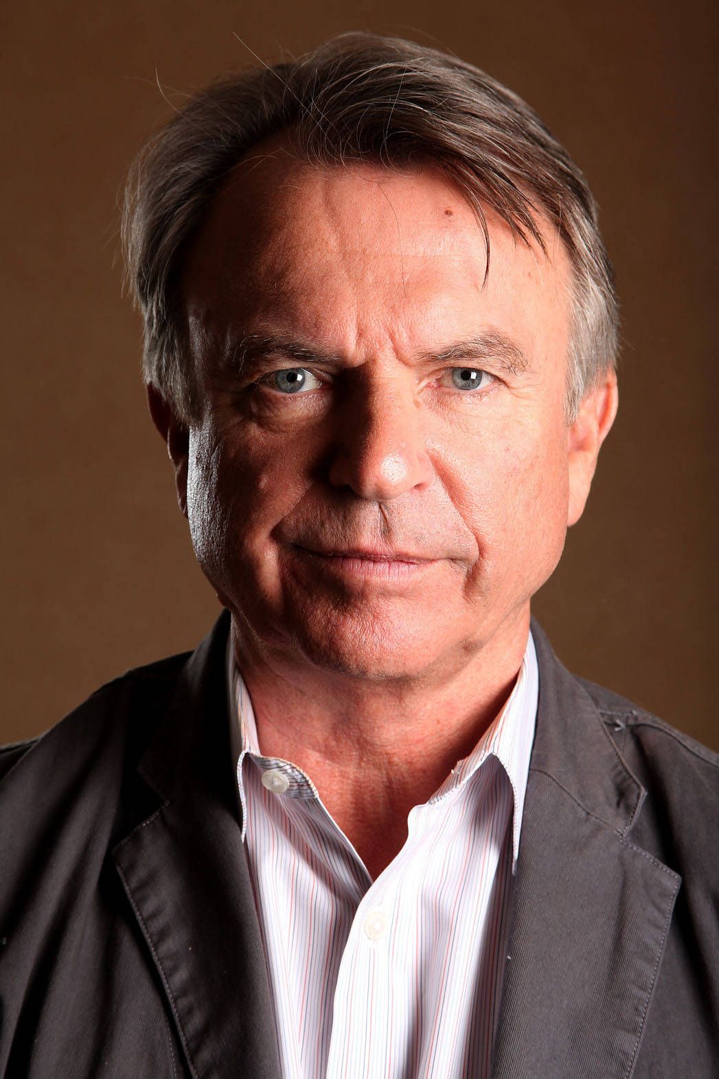 1047x1572 Download Sam Neill The Hunter Portrait Photohoot Wallpaper