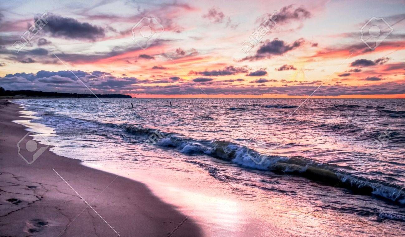 1300x760 Gorgeous Sunset Colors Over The Lake Huron Horizon Port Crescent State Park Port Austin, Michigan , Picture and Royalty Free Image. Image 23574165