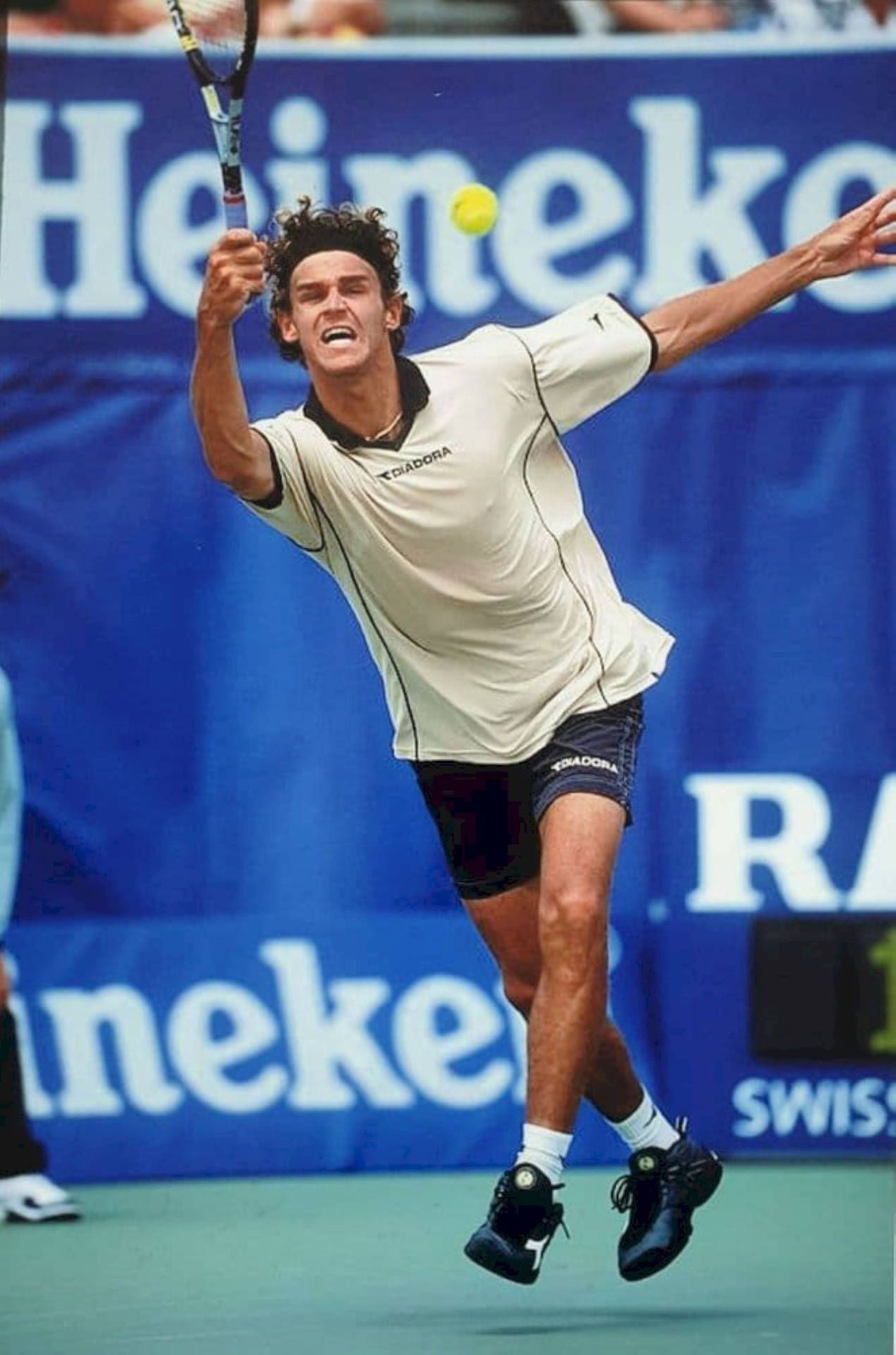 1271x1920 Download Gustavo Kuerten Chasing The Ball Wallpaper