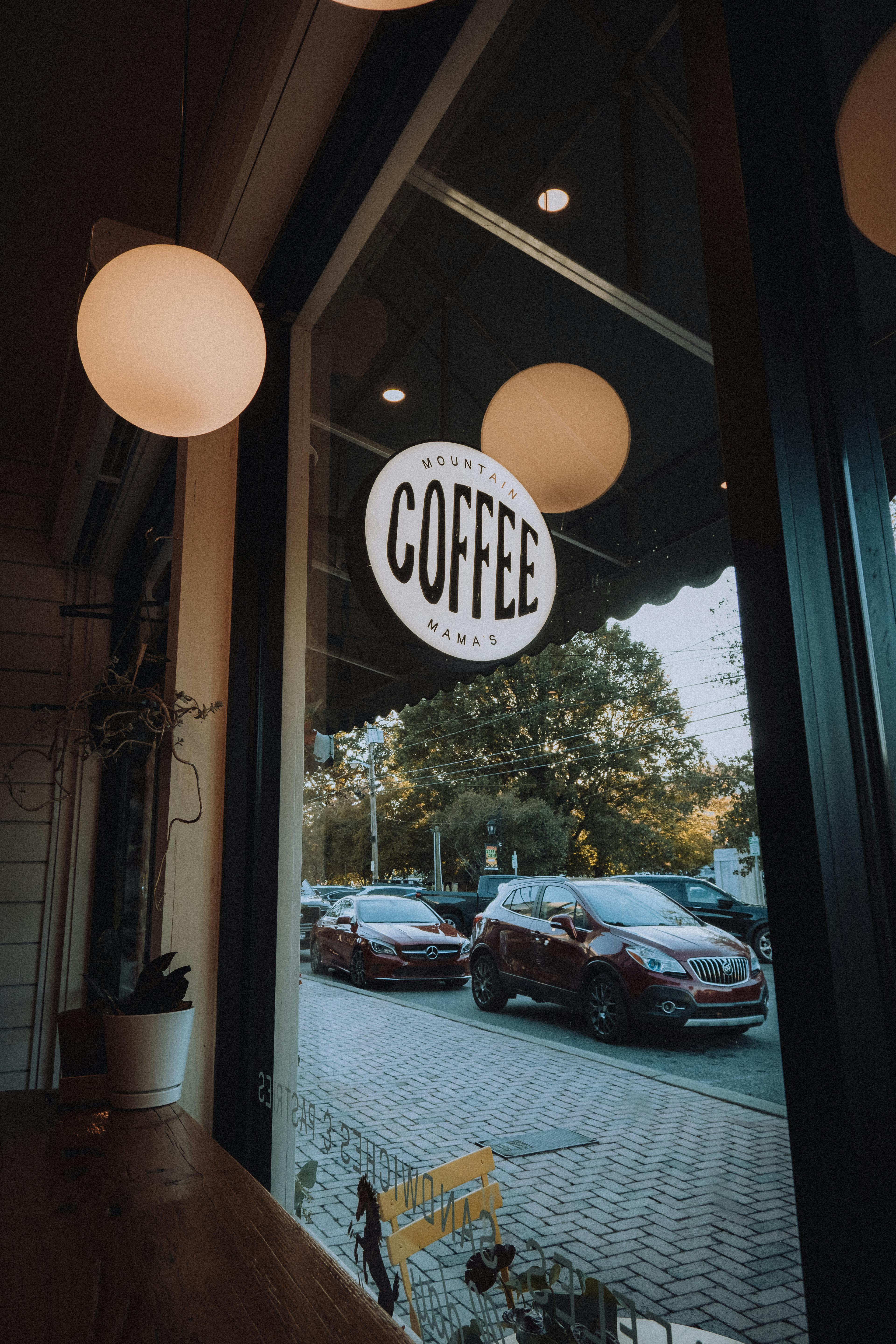 3840x5760 Charming Coffee Shop Window with Festive Decor · Free