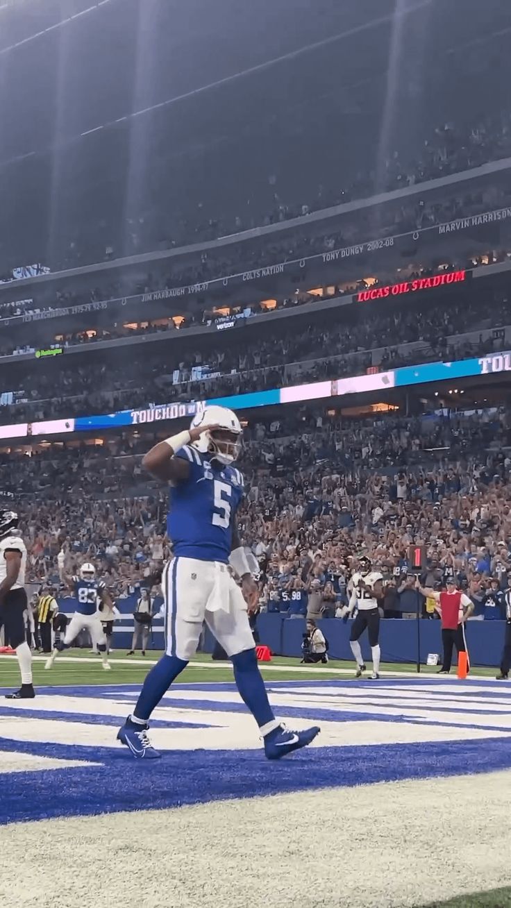 736x1308 Field View Anthony Richardson 360 spike celebration after touchdown