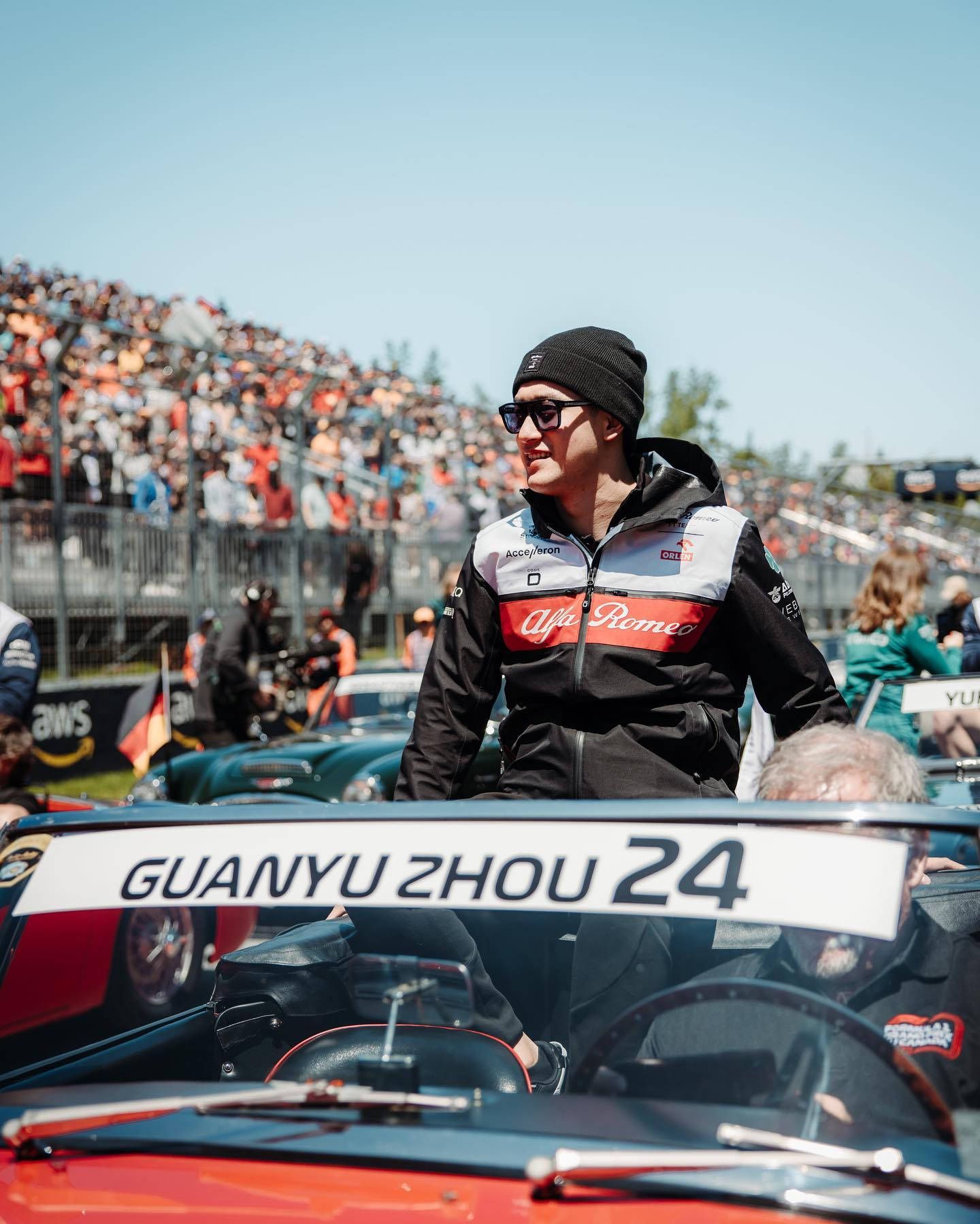 1440x1799 Download Guanyu Zhou in a Motoring Event Wallpaper